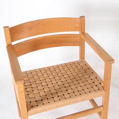 Coppia di poltrone in legno e corda