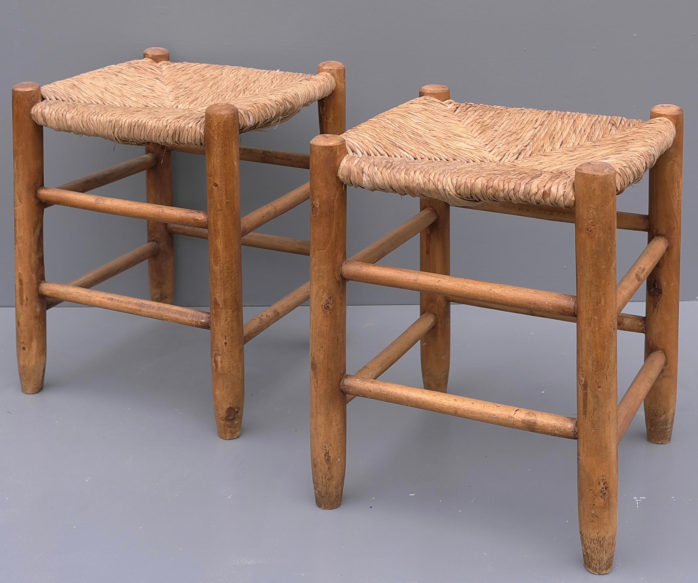 Pair of wood and rush stools in style of Charlotte Perriand, France 1960's.