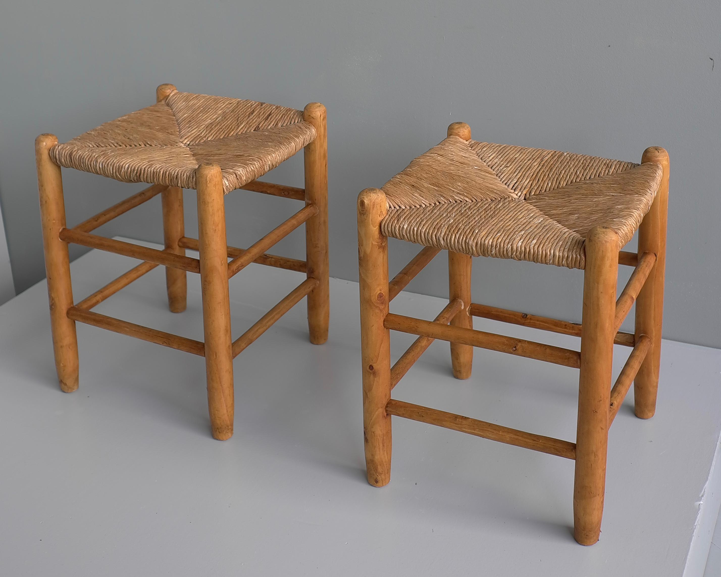 Pair of wood and rush stools in style of Charlotte Perriand, France 1960's.