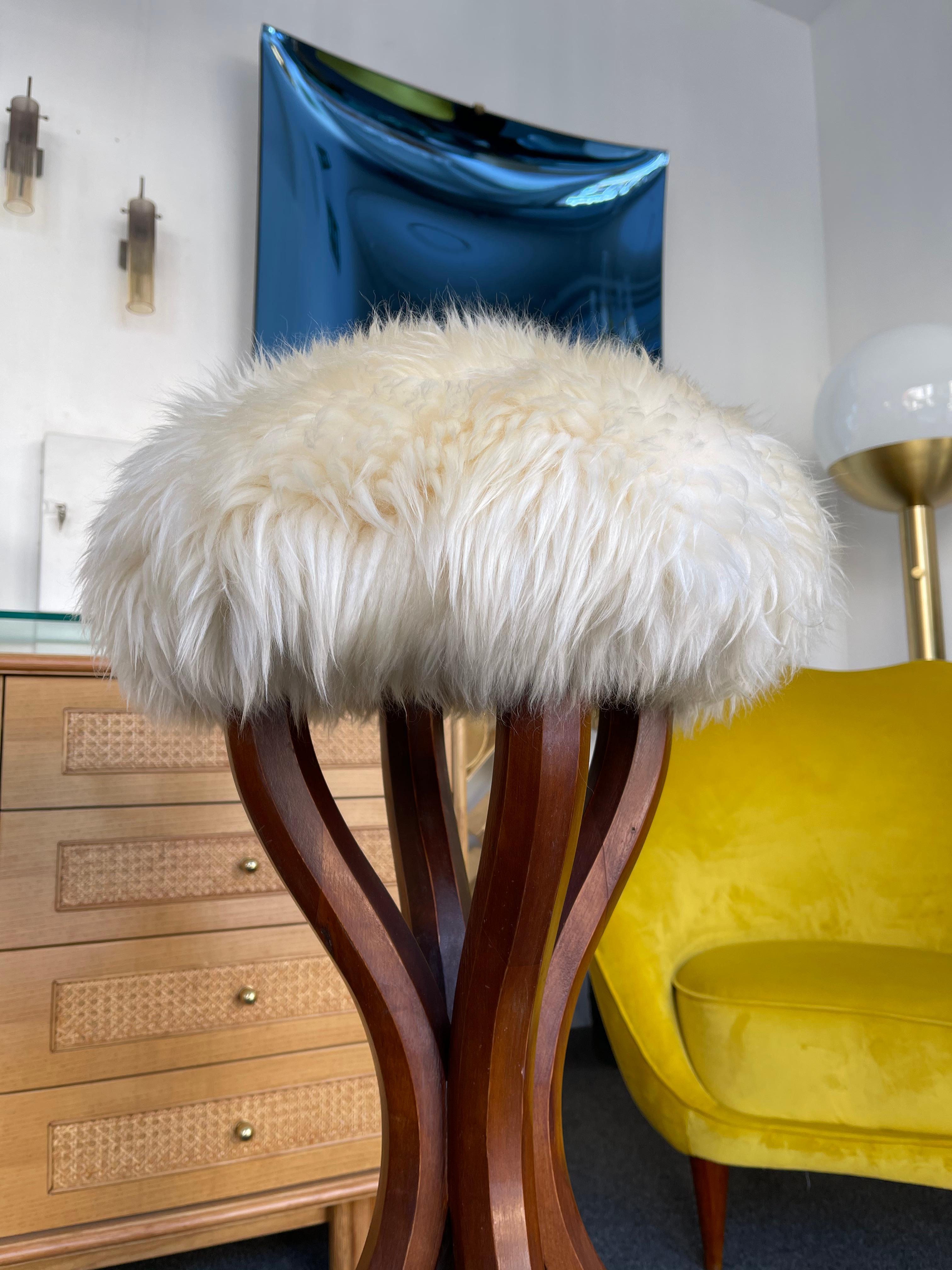 Pair of massive wood and sheepskin sheep fur leather top bar stools. Art Nouveau or Art Deco mood.