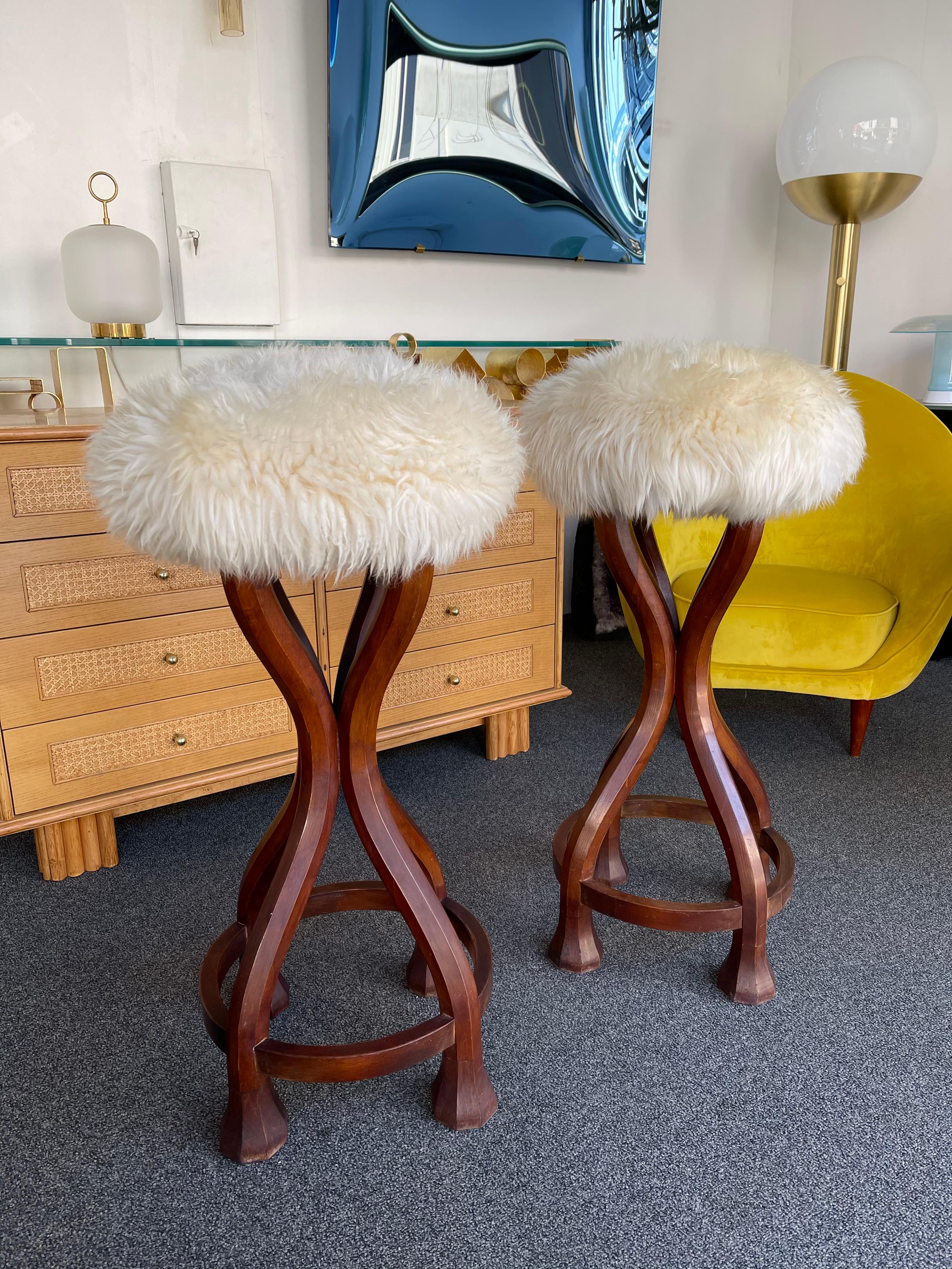 Italian Pair of Wood and Sheepskin Bar Stools. Italy, 1970s For Sale