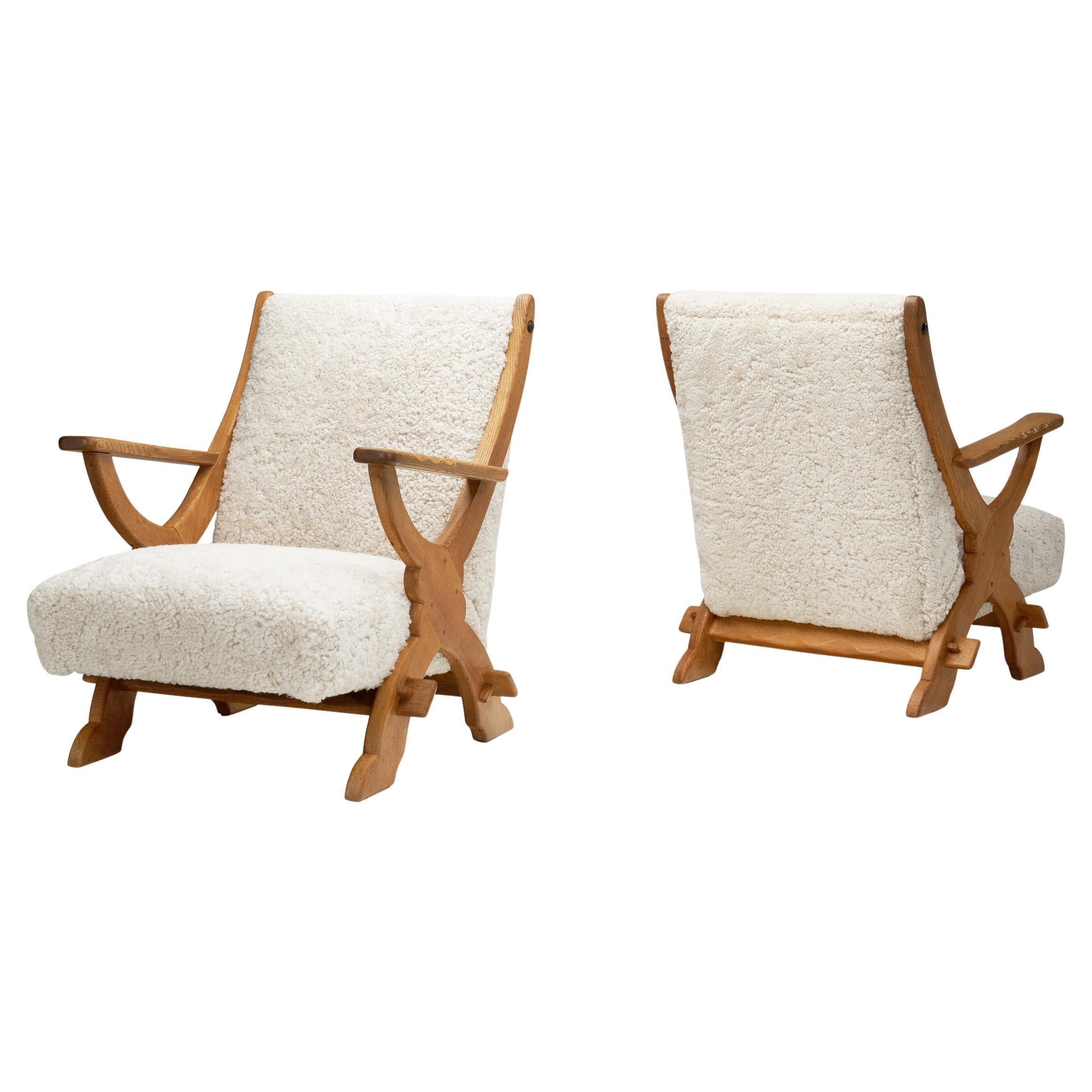 Pair of Wood and Sheepskin Lounge Chairs, Europe Mid-20th Century