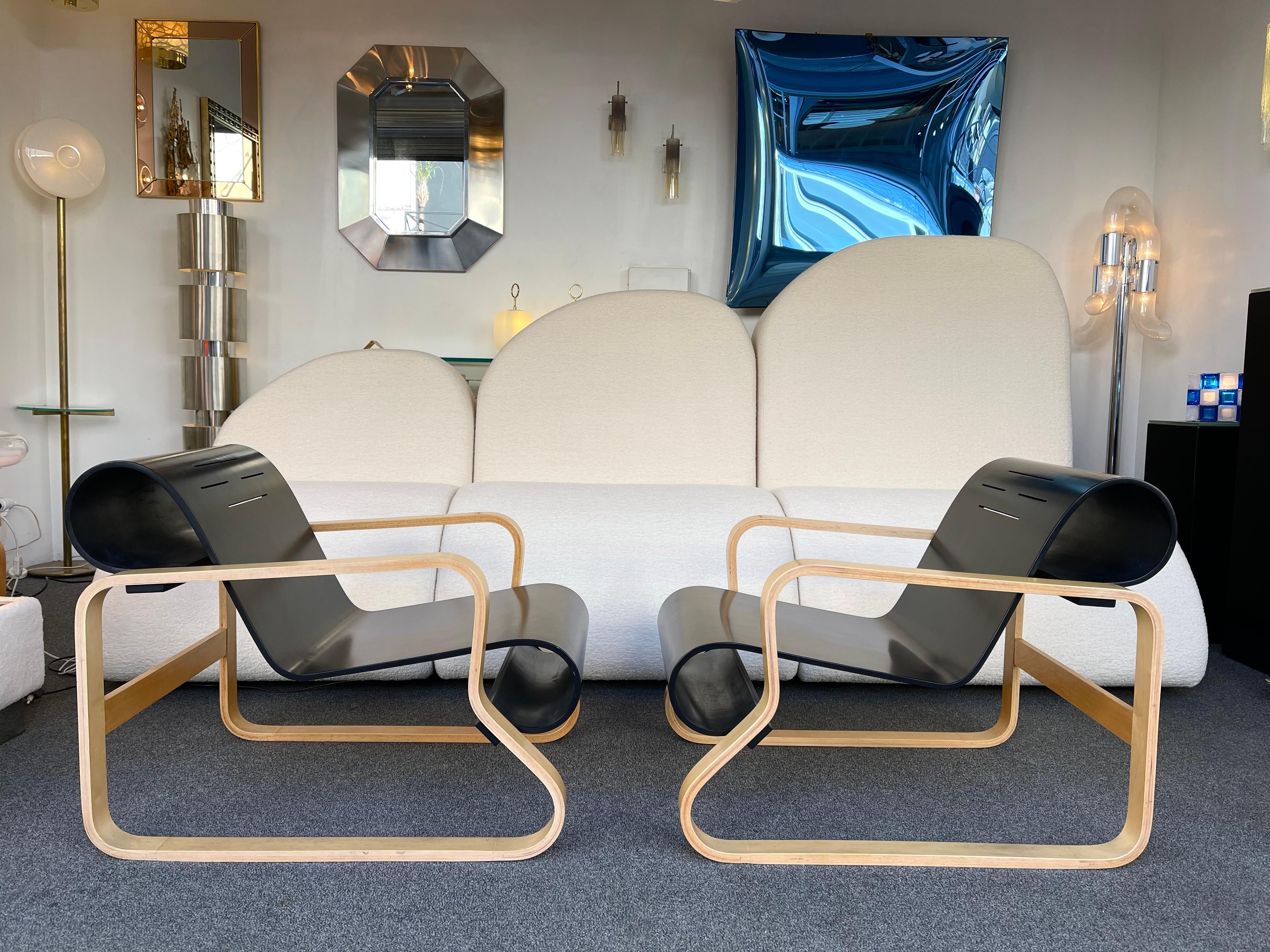 Pair of wood birch armchairs model 41 Paimio by Alvar Aalto, an old Artek edition produced and acquired by previous owner during the 1970s. Designed by Alvar Aalto in 1932. The 41 is considered one of Alvar Aalto’s masterpieces.