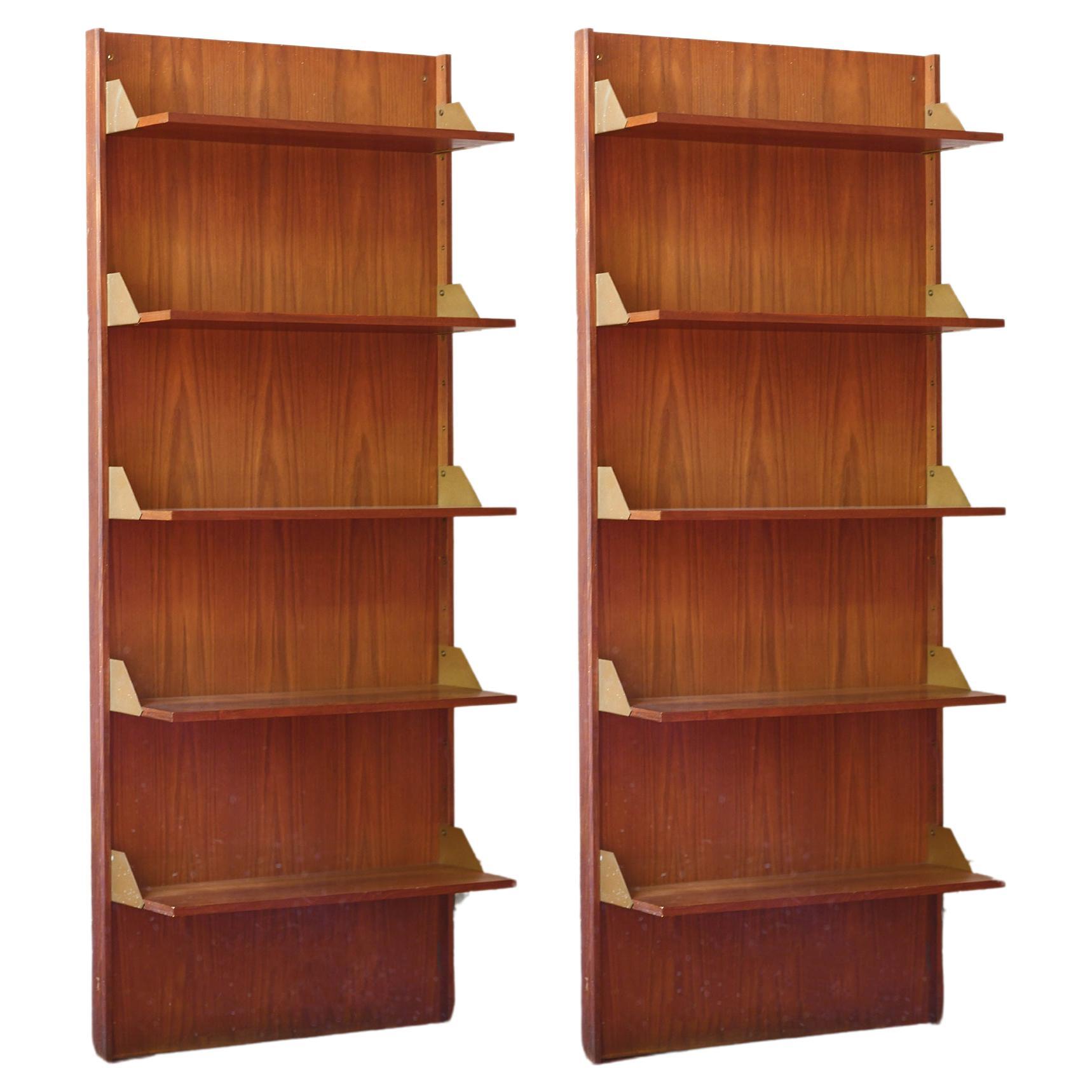 Pair of wood bookcases with brass details from the 1960s For Sale