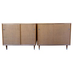 Retro Pair of Wood Cabinets with Sliding Grass Covered Doors, by Herman Miller