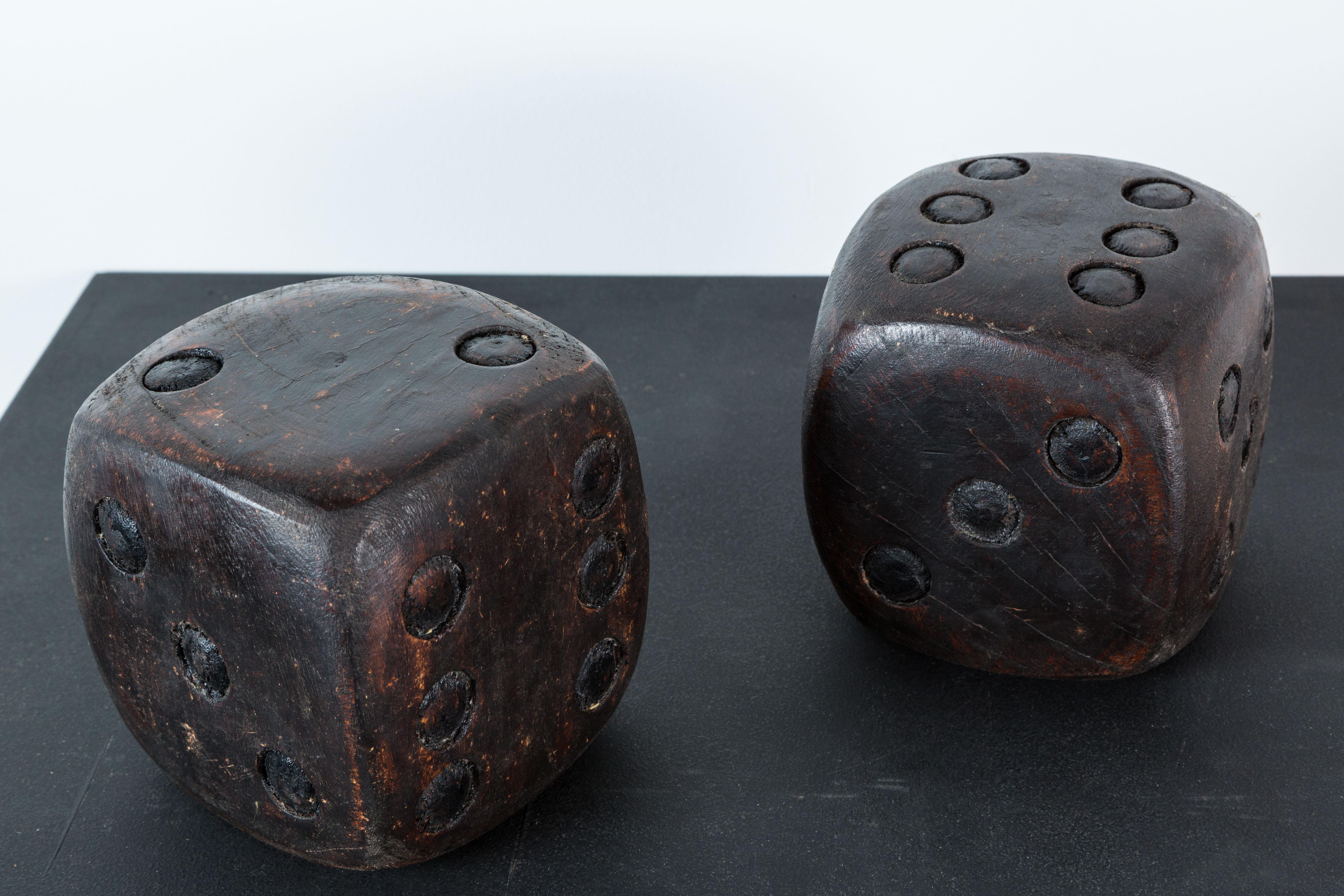Pair of nicely carved Folk Art dice. Quite heavy and solid. Original stained surface.