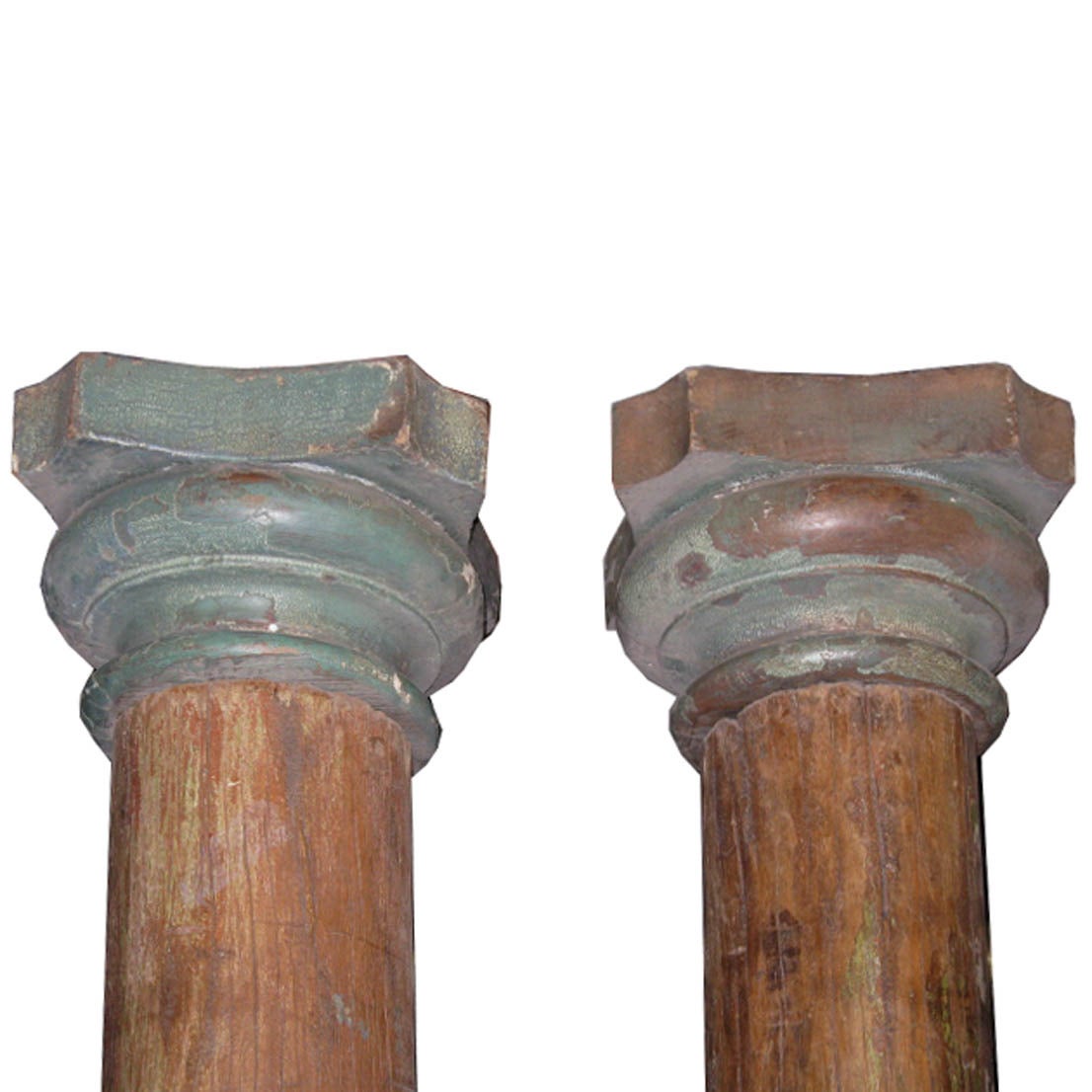 Pair of beautiful wood columns from a Haveli in Gujarat, India. The columns have carved wood capitals and stone bases. Originally used to adorn an entry in a traditional Indian Haveli. Assembly required.