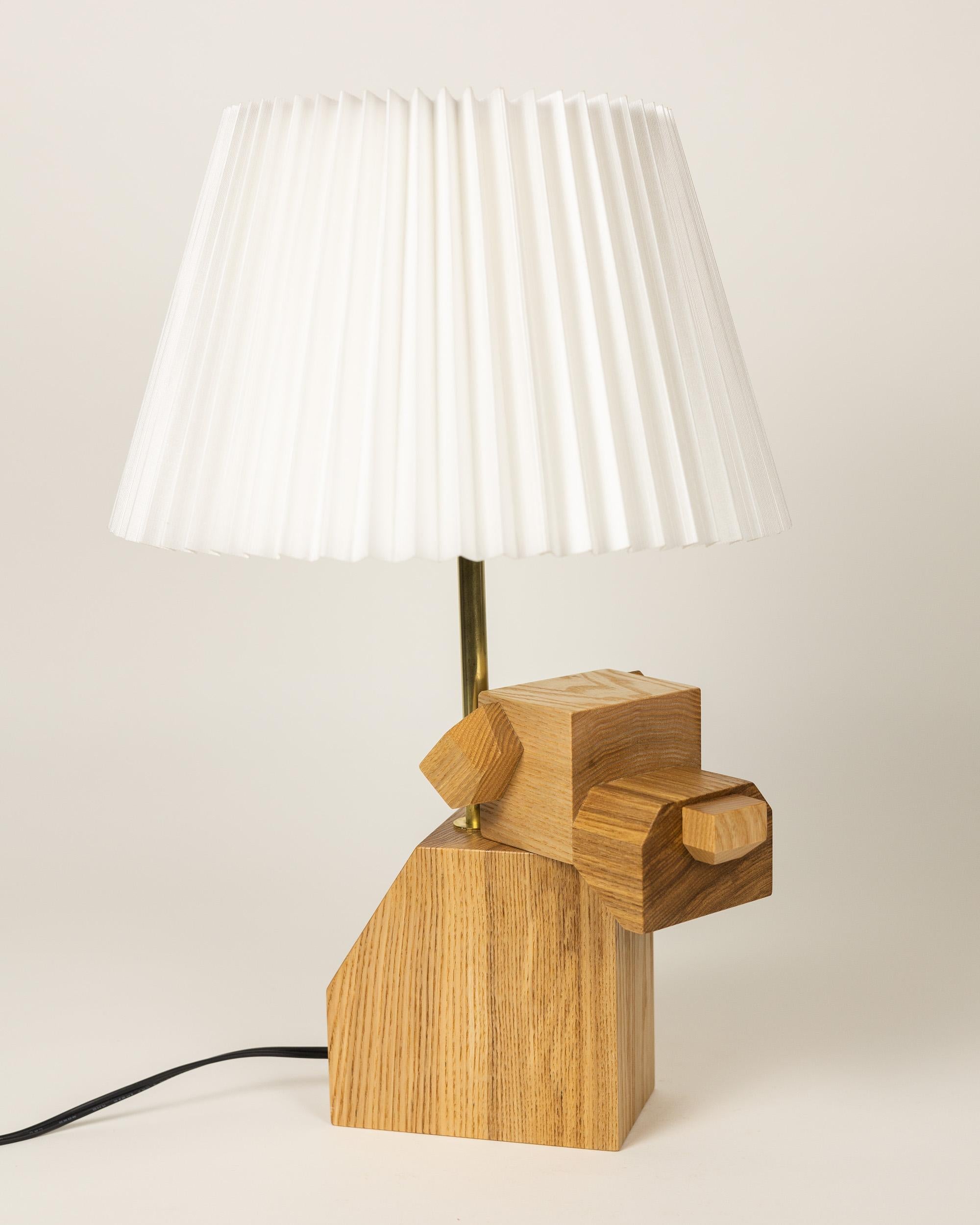 Contemporary Pair of Wood Dog Table Lamps with White Fabric Shades, hand-crafted, hardwood For Sale