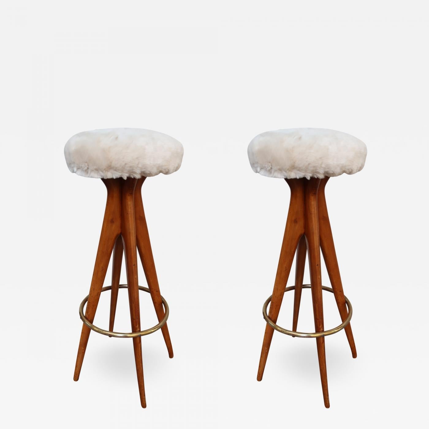 Pair of wood, brass and leather stools, Italy, 1950. Excellent condition.