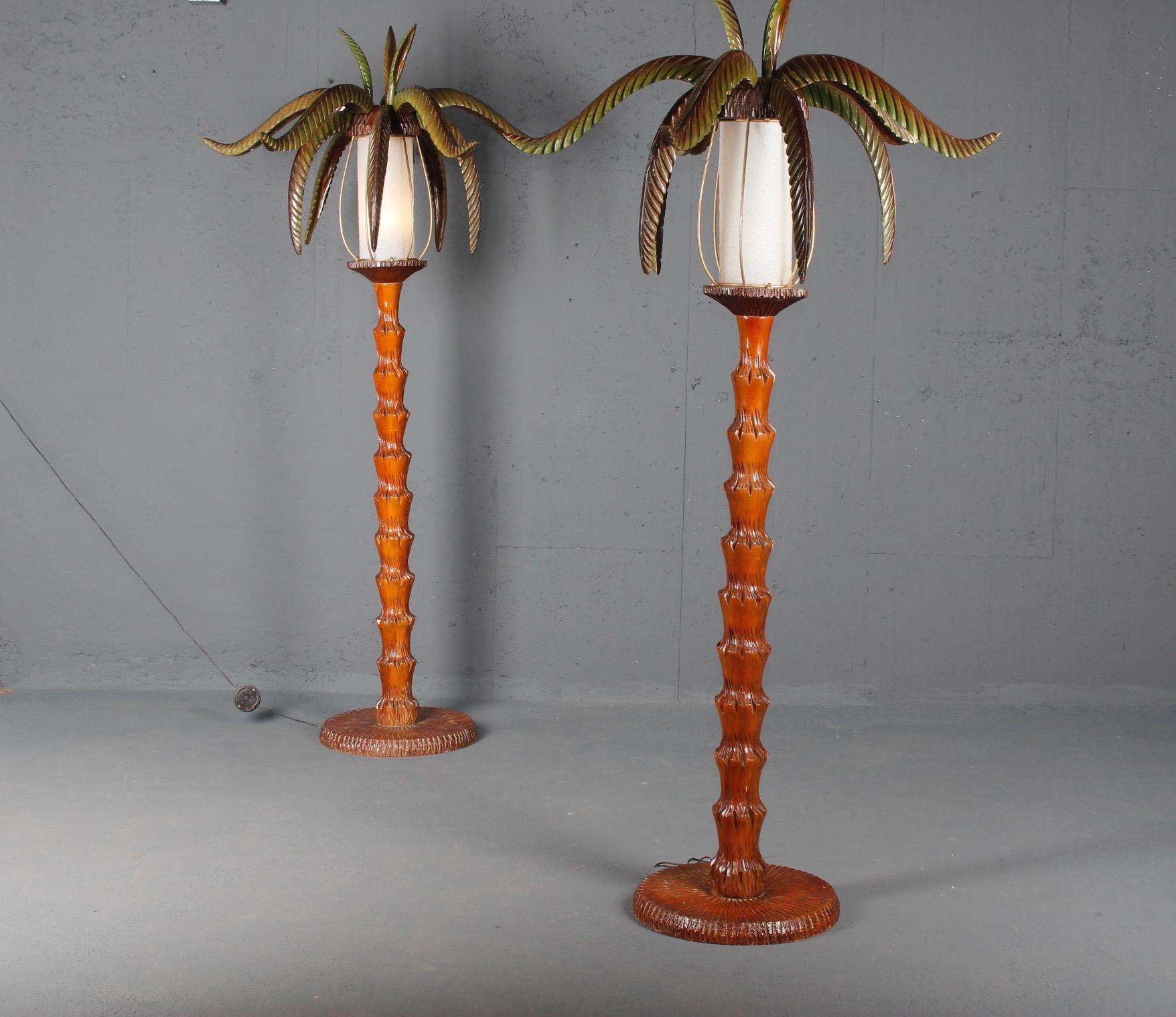 Pair of wood palm floor lamp.