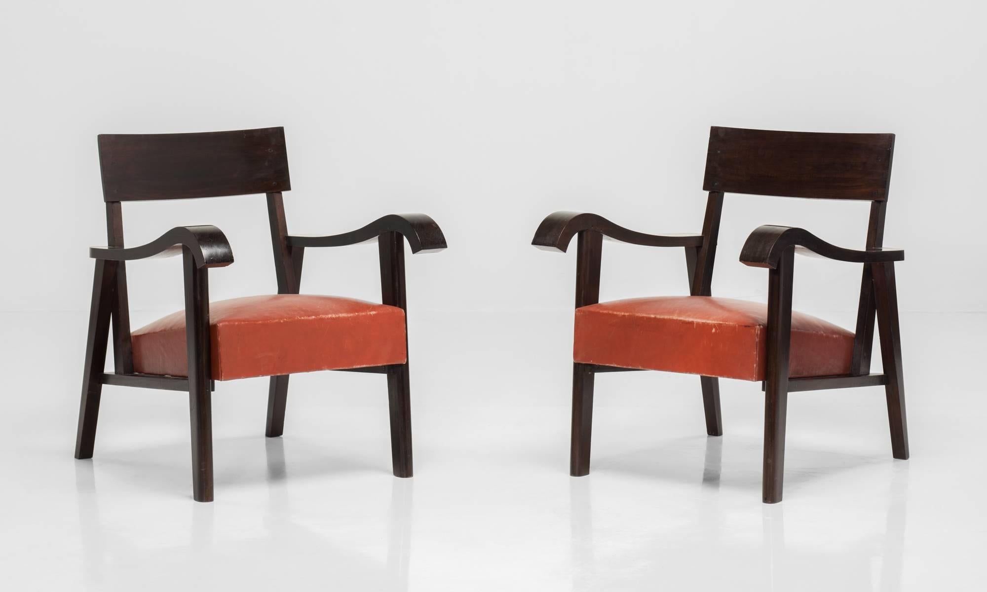 Pair of Wood Slab and Red Leather Armchairs, England, circa 1940

Elegant forms with substantial weight and original leather upholstery.