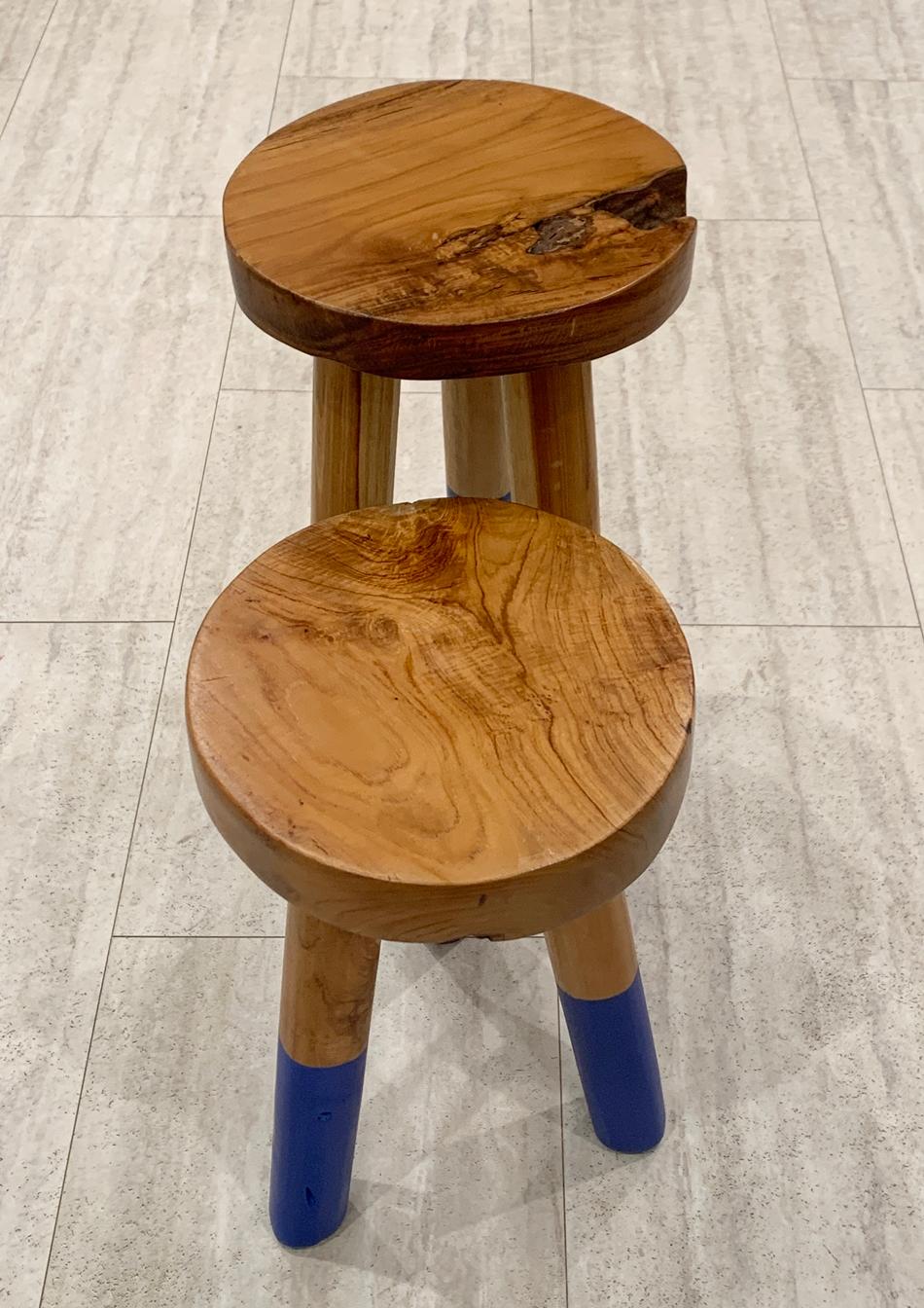 Beautiful pair of wooden stools by Outlook International LTD.The stools are made of thick solid wood, they are heavy and solid and in very good condition.

Measurements:
The taller one is 19.5 high x 9.5 in diameter
The shorter one is 15.25 high