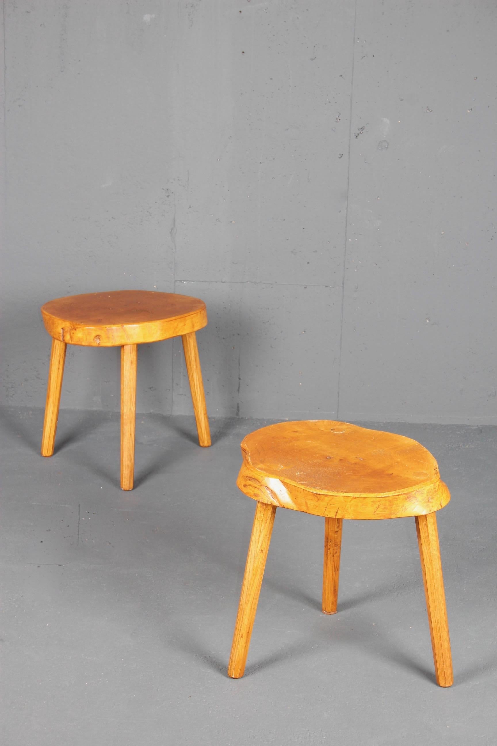 Pair of wood forme libre stools.