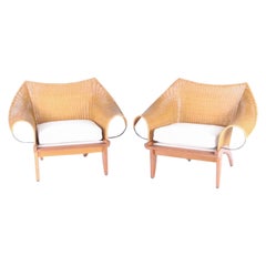 Pareja de sillones de madera, mimbre y hierro