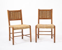 Pareja de sillas de madera y paja tejida de Emanuele Rambaldi, Italia, años 50