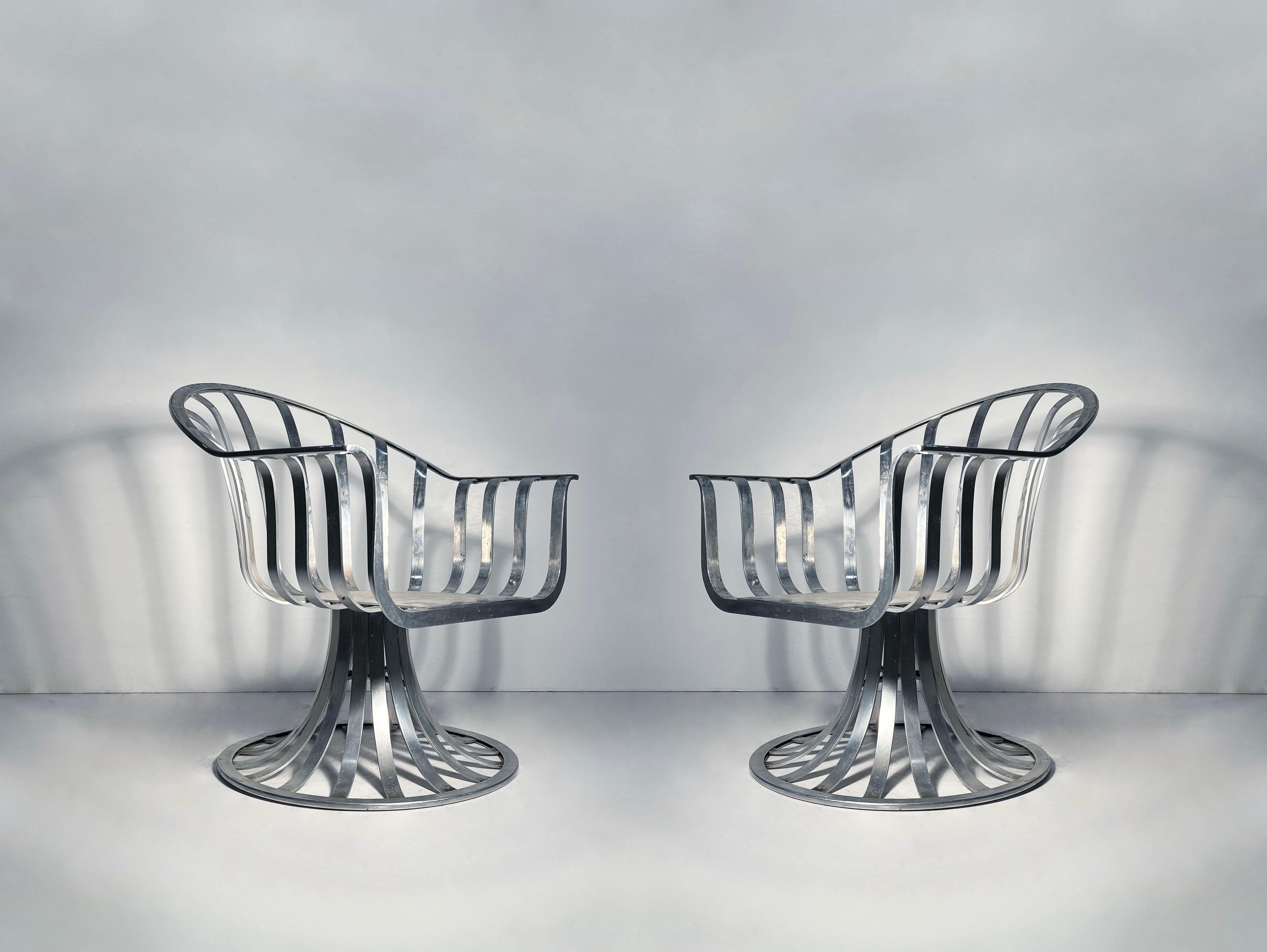 Pair of Woodard Aluminum Lounge Chairs by Herbert Saiger

These are the lower wider variation intended to be lounge side chairs. 

Seat height is 12