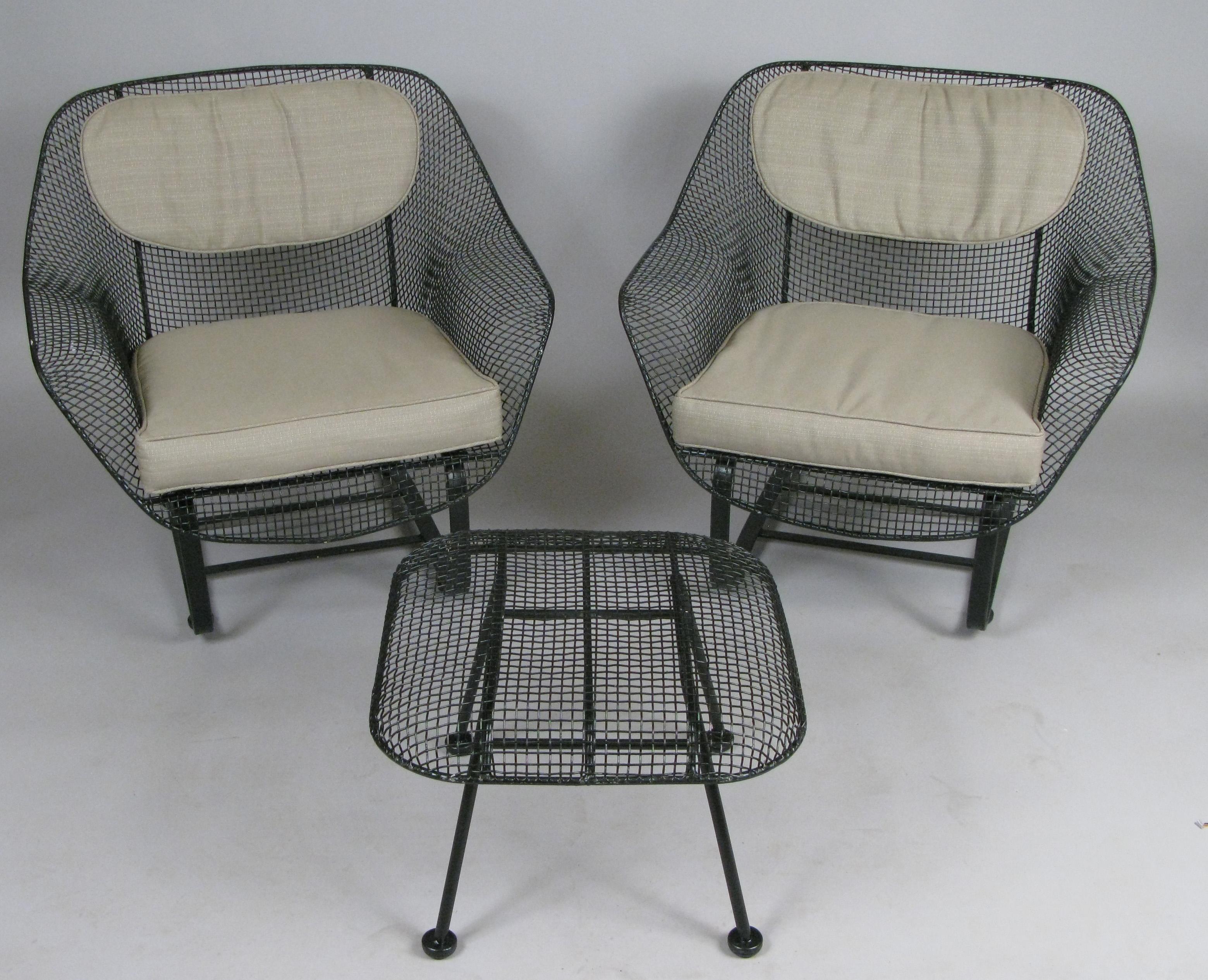 A pair of Classic vintage 1950s 'Sculptura' lounge chairs by Russell Woodard. The most comfortable and desirable of Russell Woodard's Classic and iconic 'Sculptura' collection, the lounge chair is formed entirely of woven steel mesh, mounted on a