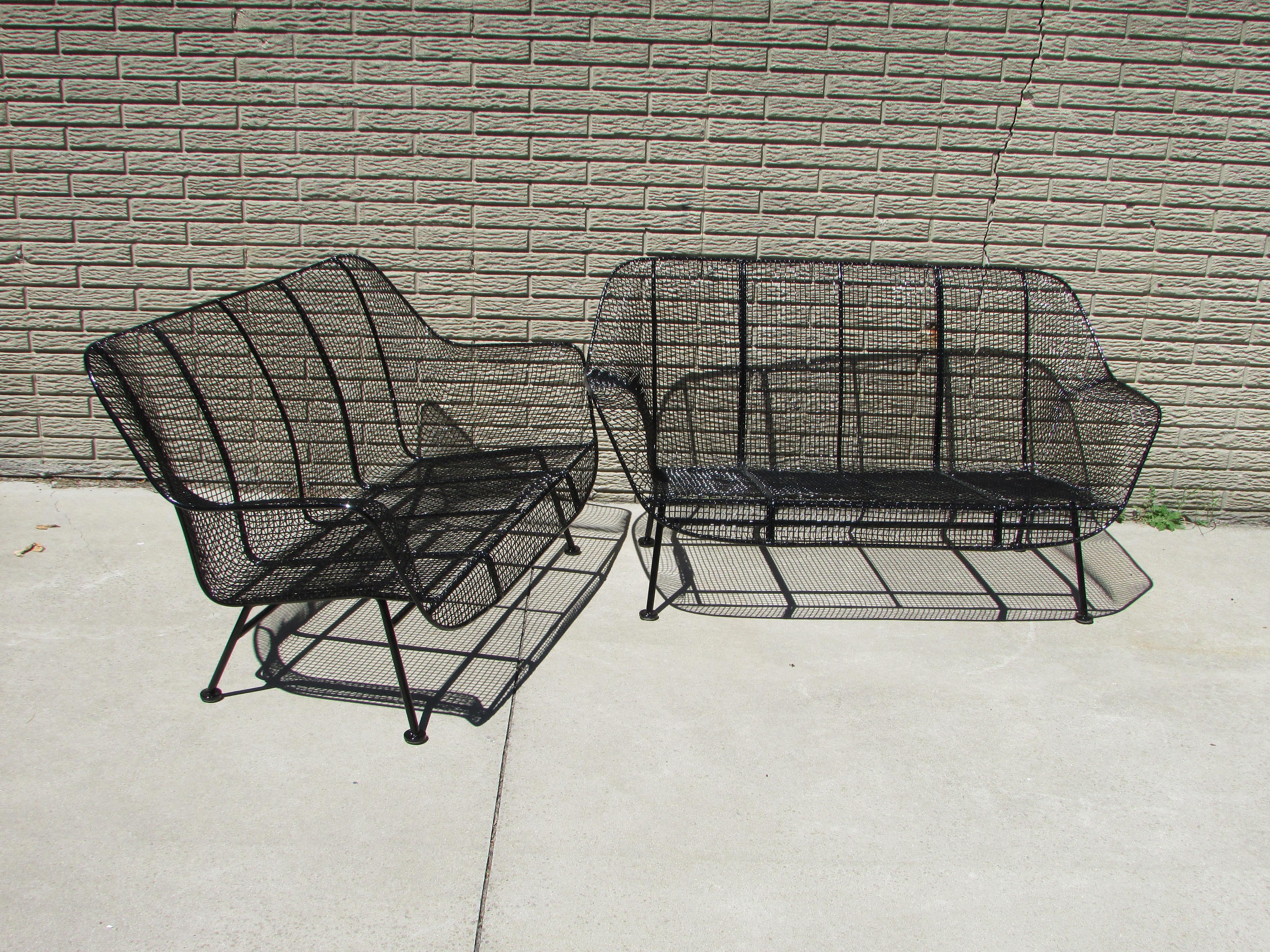 American Pair of Woodard Wrought Iron with Steel Mesh Settees Recently Powder Coated