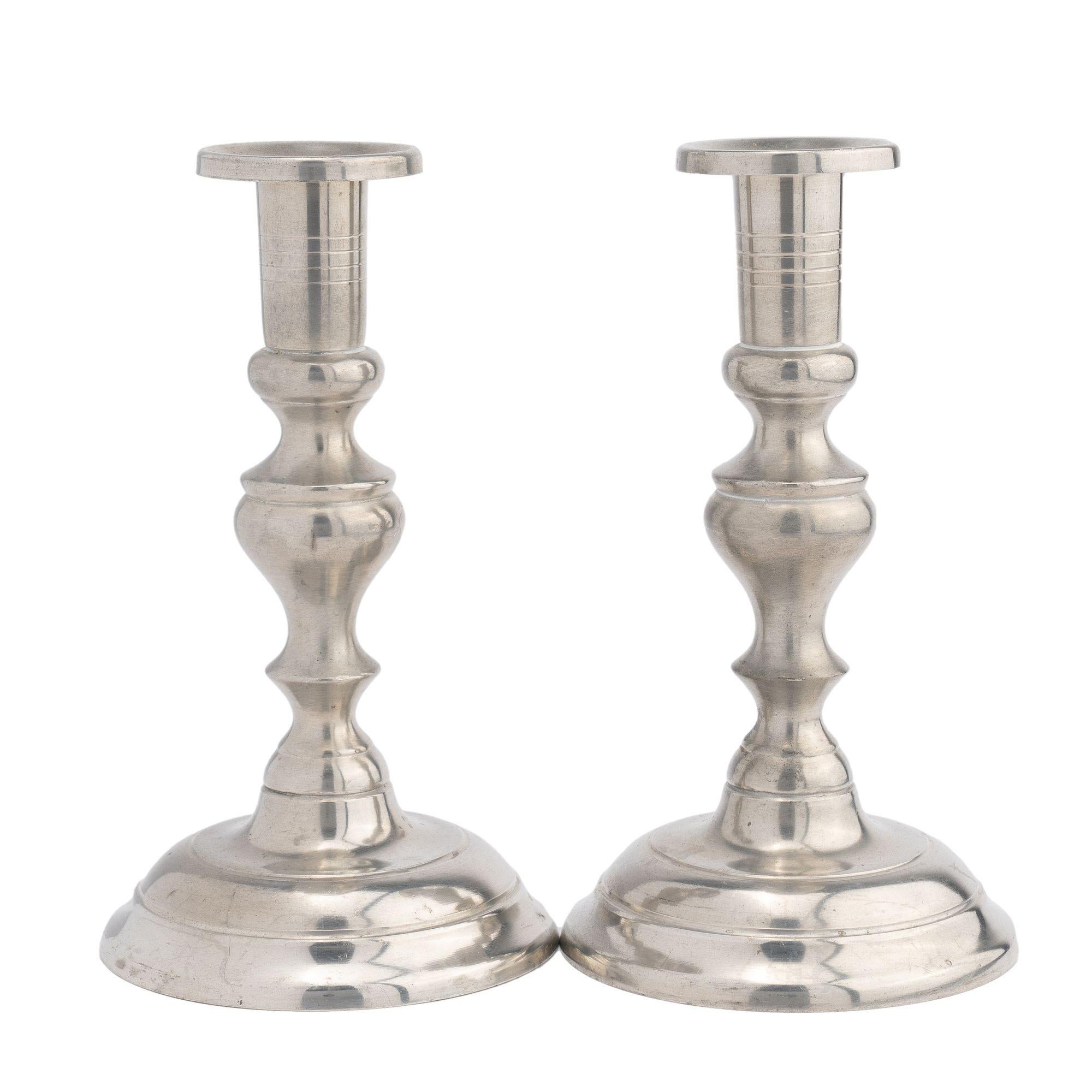 American Pair of Woodbury Pewter circular dome base pewter candlesticks, 1952 For Sale