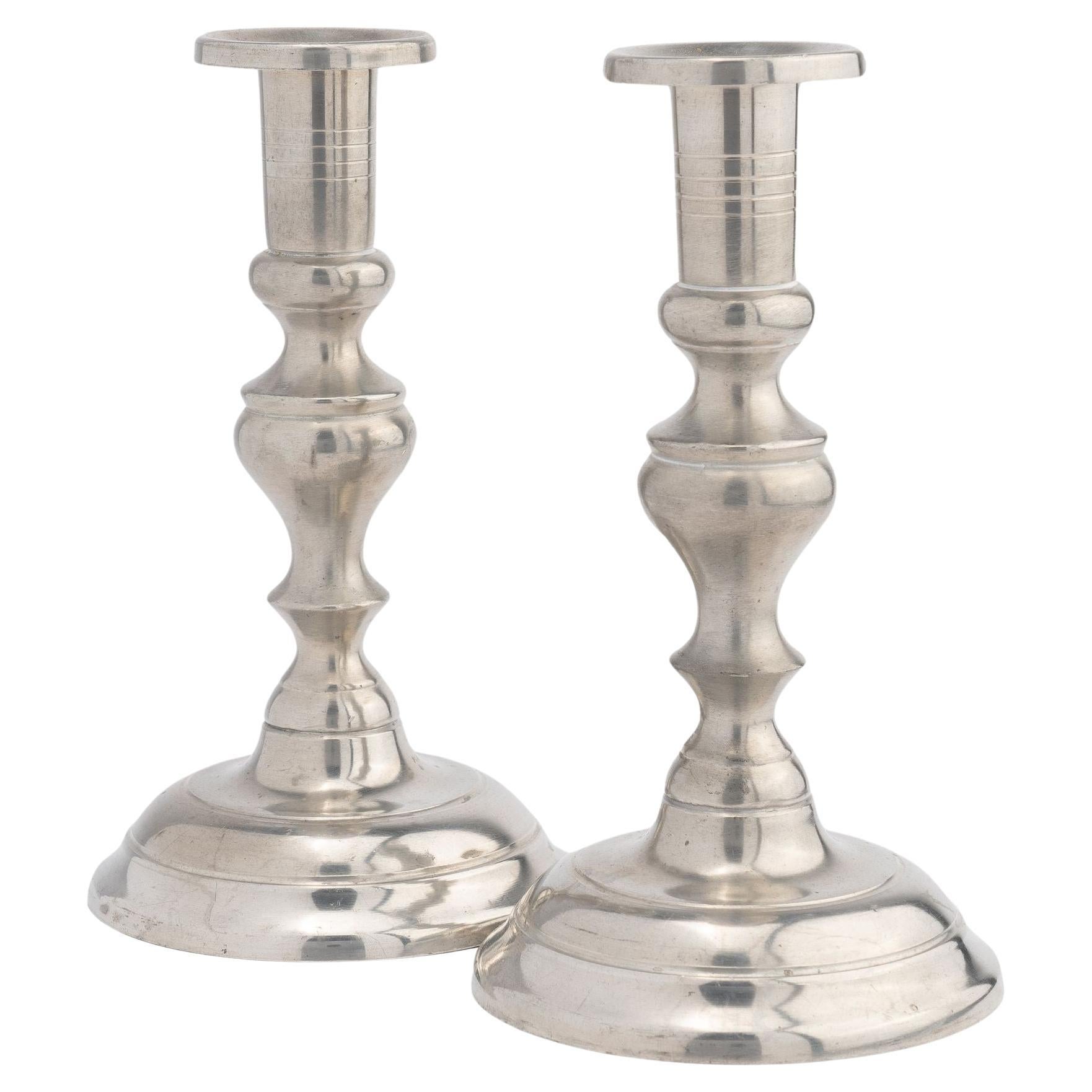 Pair of Woodbury Pewter circular dome base pewter candlesticks, 1952 For Sale