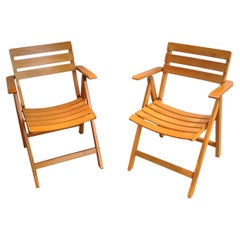Paire de fauteuils en bois, œuvre française signée Clairitex, vers 1970