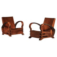 pair of wooden armchairs from the 30s and 40s