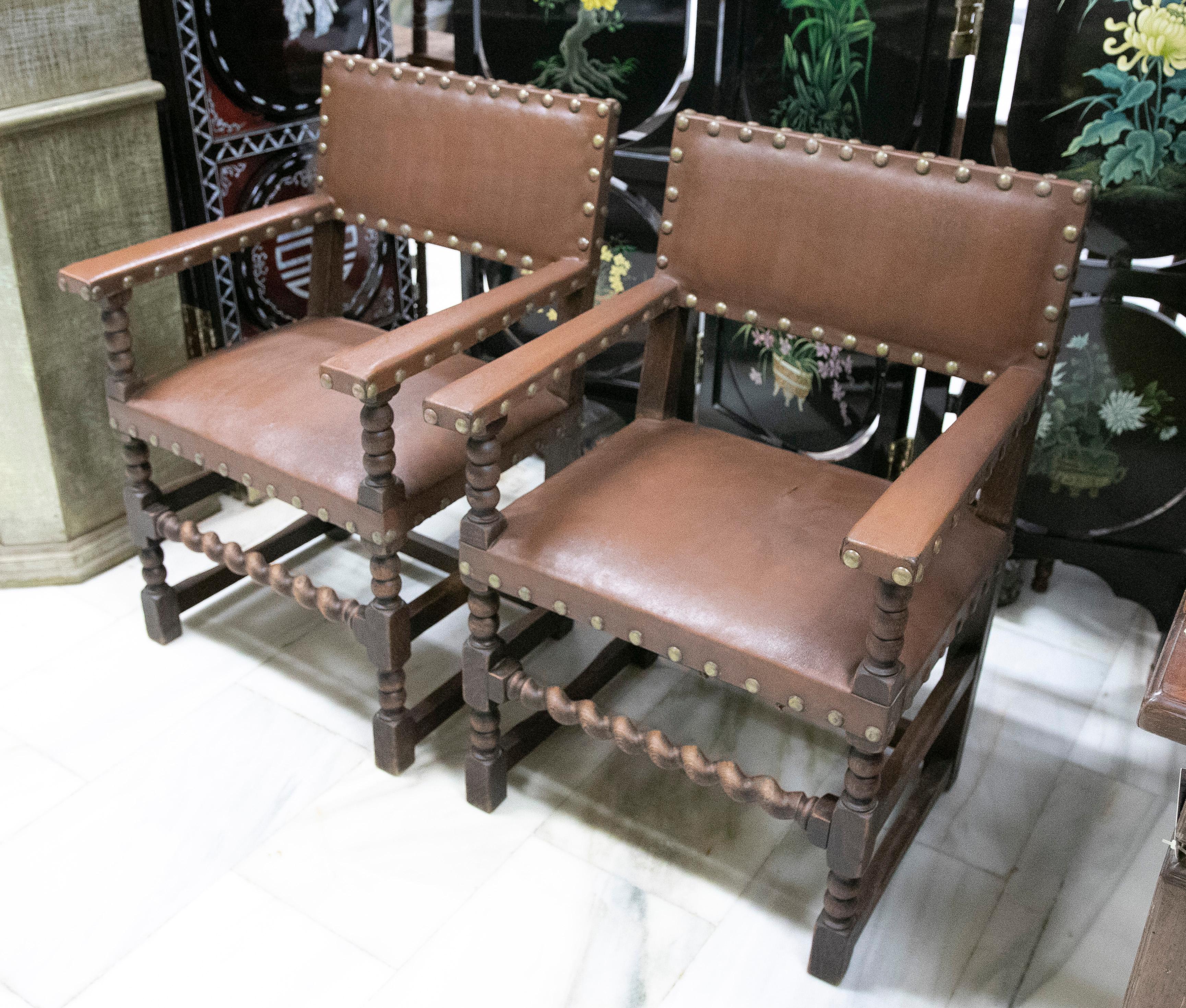 Spanish Pair of Wooden Armchairs with Studded Leather Seat and Backrest For Sale