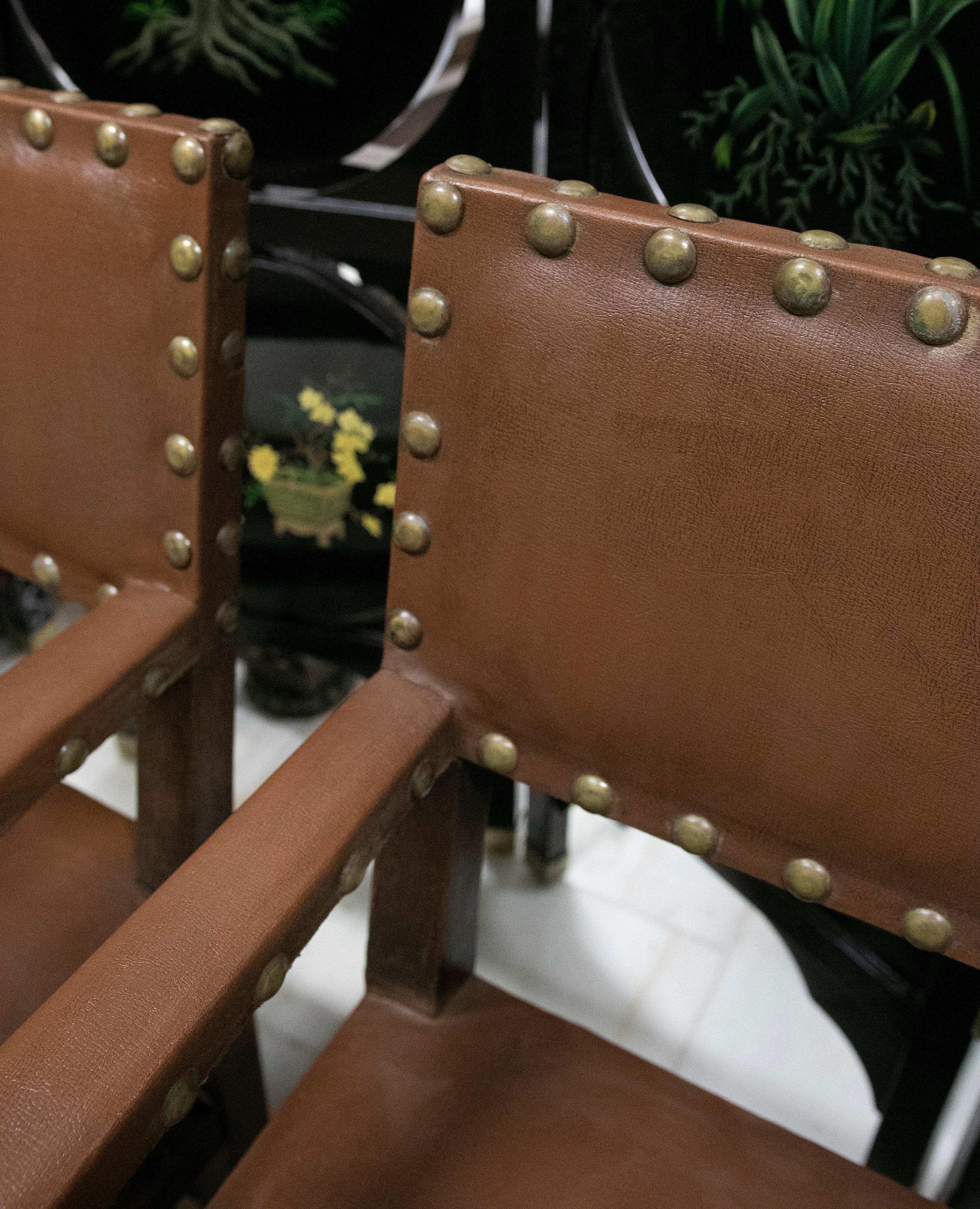 Pair of Wooden Armchairs with Studded Leather Seat and Backrest In Good Condition For Sale In Marbella, ES