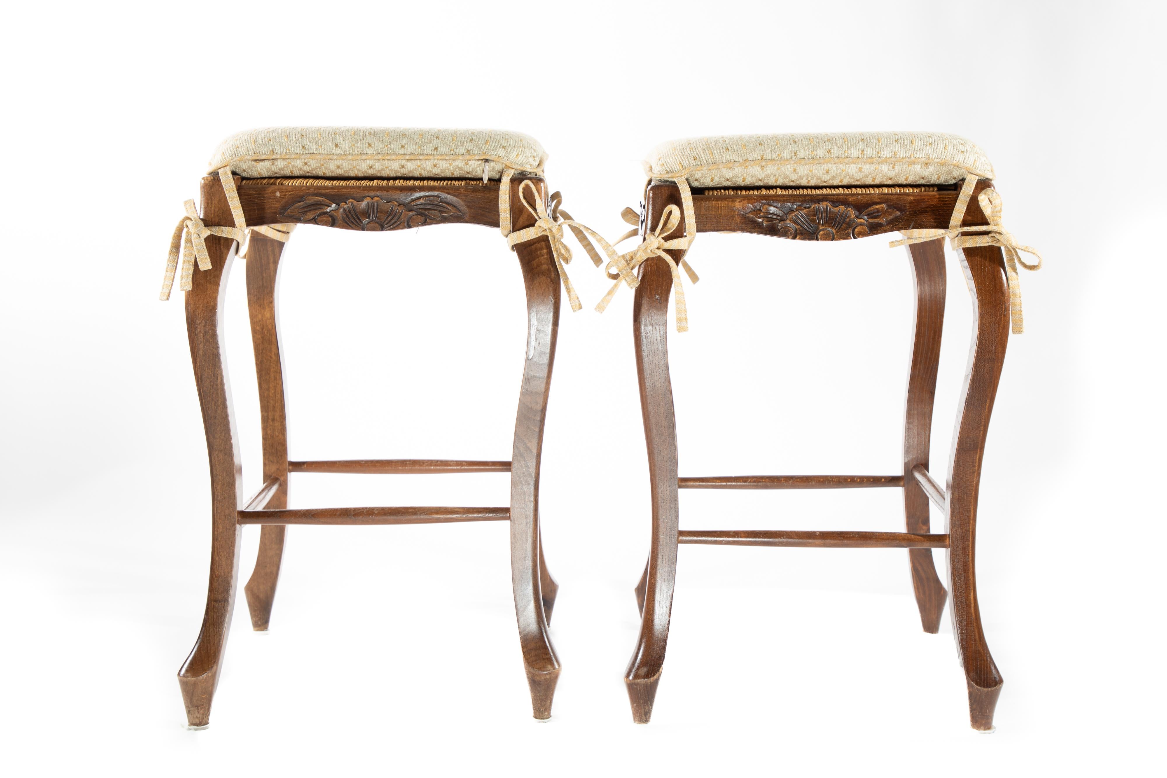 Pair of stools with rush woven seats.

2