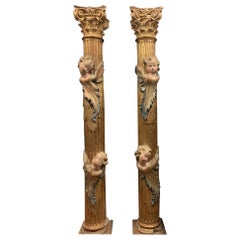 Paire de colonnes en bois, sculptées et dorées de putti polychromes, d'Espagne