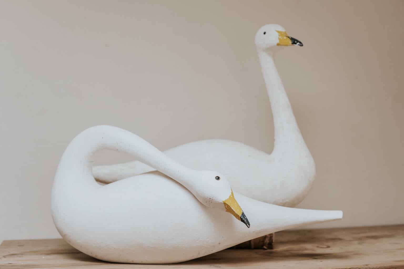 This pair of wooden decoy swans were made by Martin Scorey, British contemporary artist, born 1961, great decorative items.