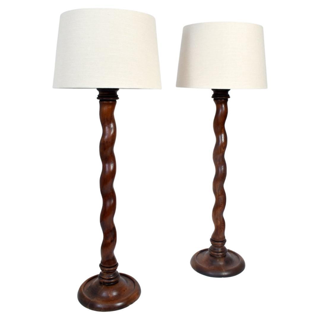 Pair of wooden floor lamps, 1920s.