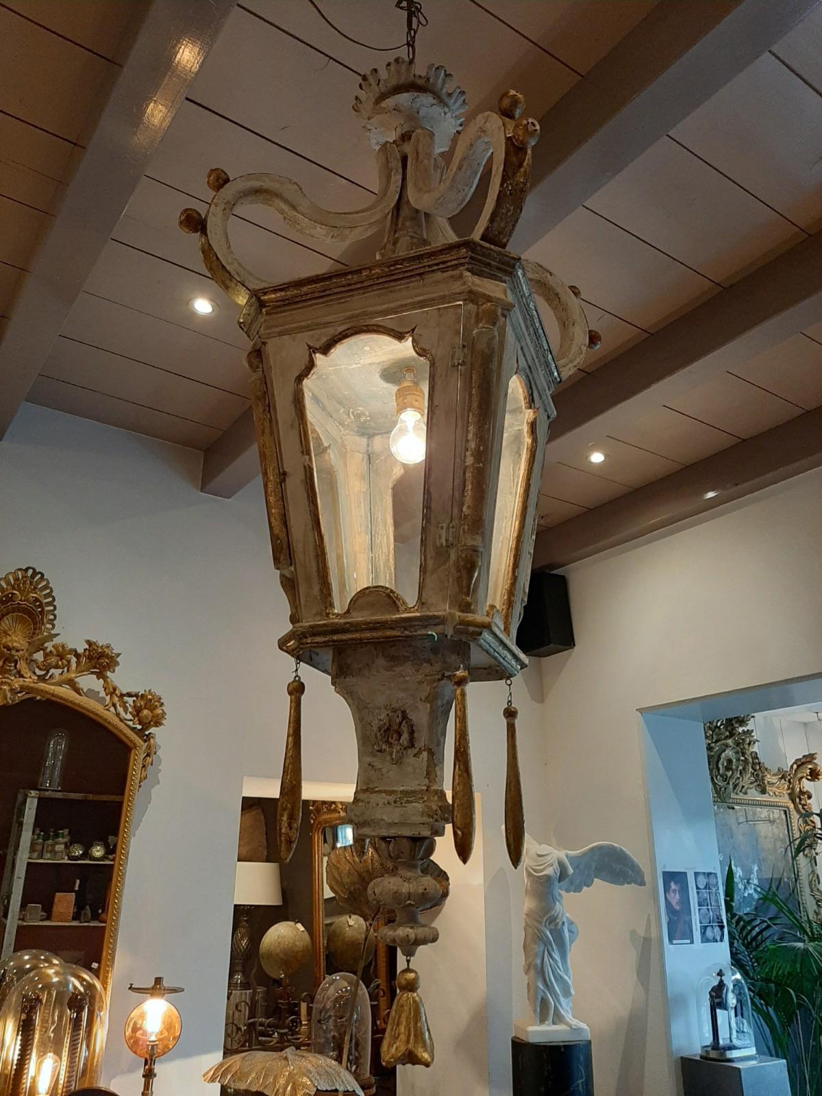 Two wooden lanterns made from 18th century fragments (parts of 18th century furniture, cupboards, paneling etc.), with old white and golden patina, in the style of French baroque.
      