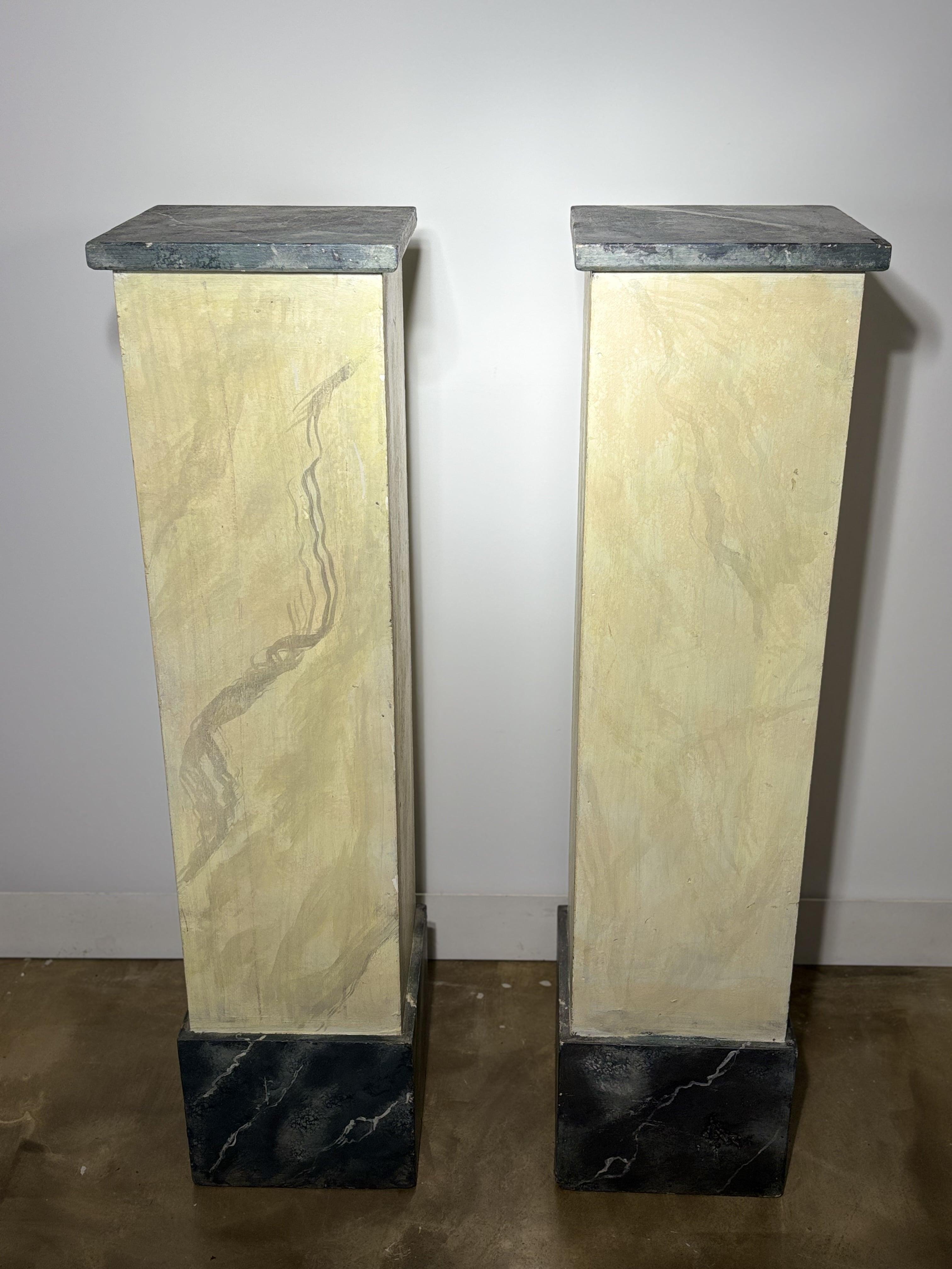 Pair Of Wooden Pedestal Columns Painted In Trompe-l'oeil Marble - 20th Century

Elegant pair of wooden pedestal columns, with painted trompe-l'oeil marble decoration.  
The central shaft imitates a yellow beige marble with flowing veins, while the