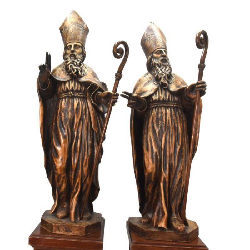 Pair of fruit wood sculpture representing 2 bishops of statue size 116 cm in height for a pedestal height of 106 cm. patina to be reviewed, 20th century period.

Additional information:
Material: Fruit woods