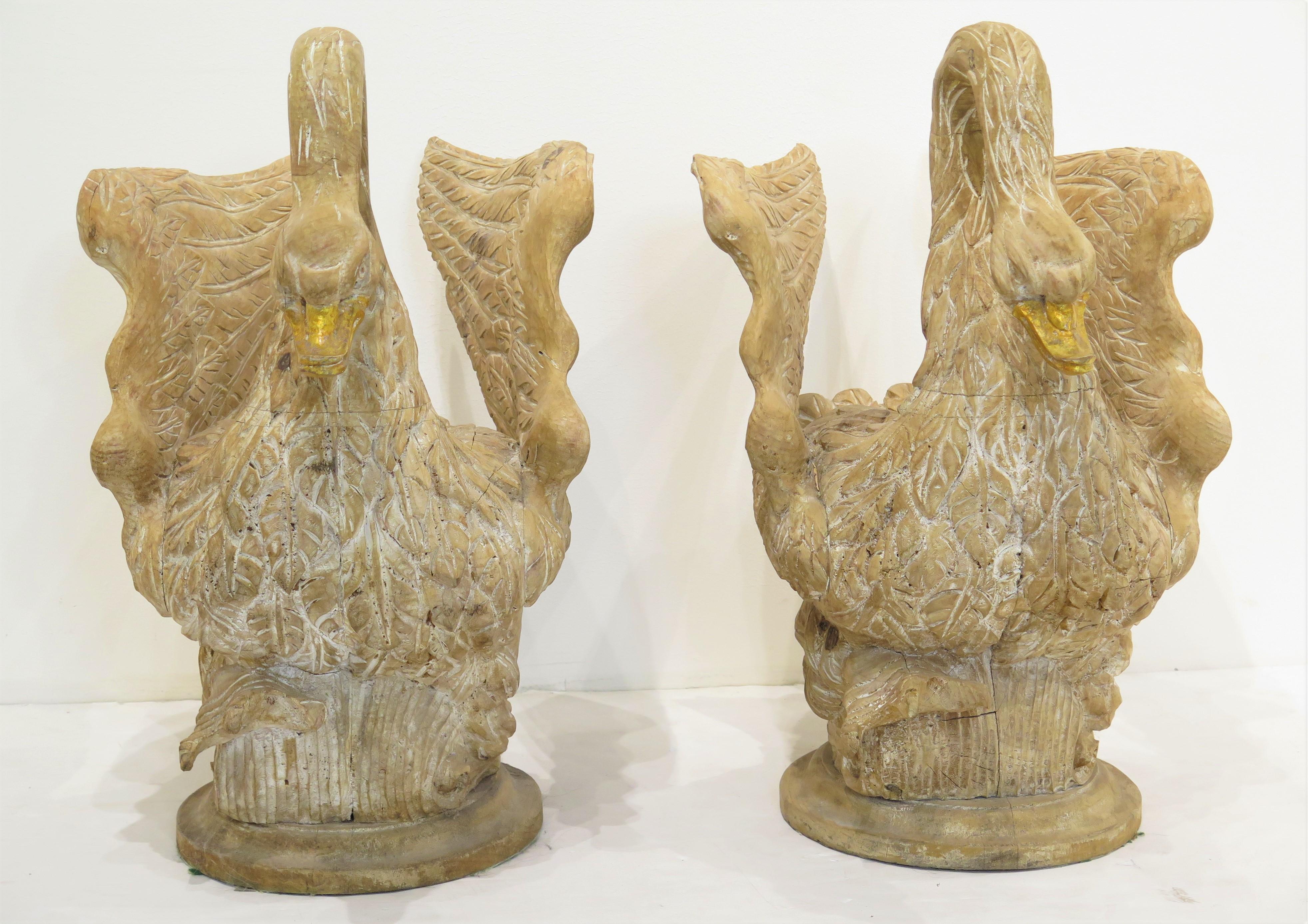 pair of large hand-carved and painted wooden swan jardinières / planters, this fantastic pair are every bit as graceful as the actual bird they depict, based on the curved neck and downward pointing bill, this is most likely a mute swan, which is