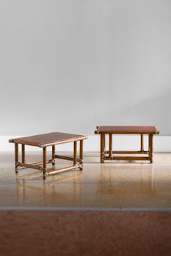 Pair of wooden tables with leather bindings by Lyda Levi - McGuire