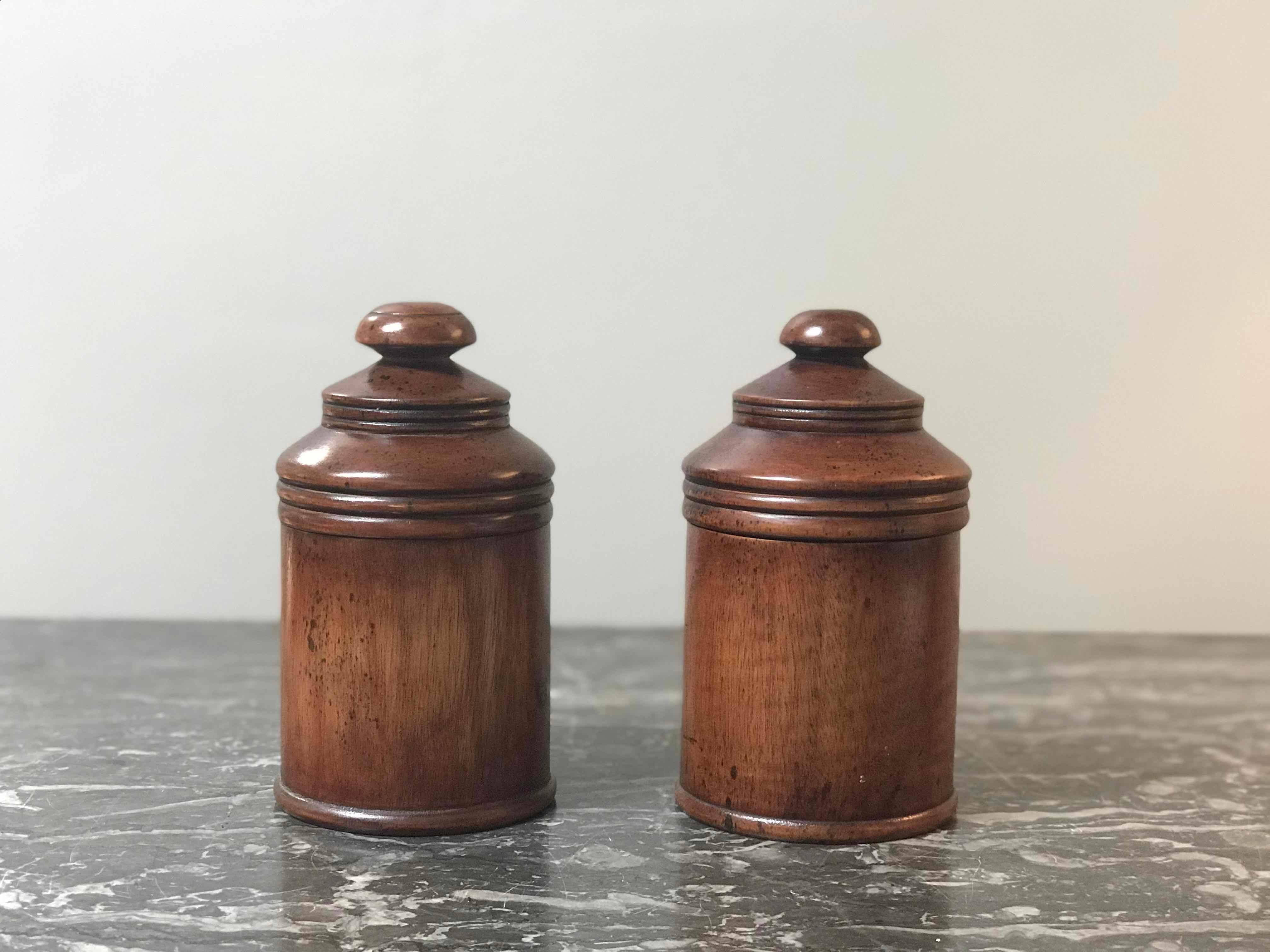 Pair of wooden treen pots with lids from late 19th century England. 
