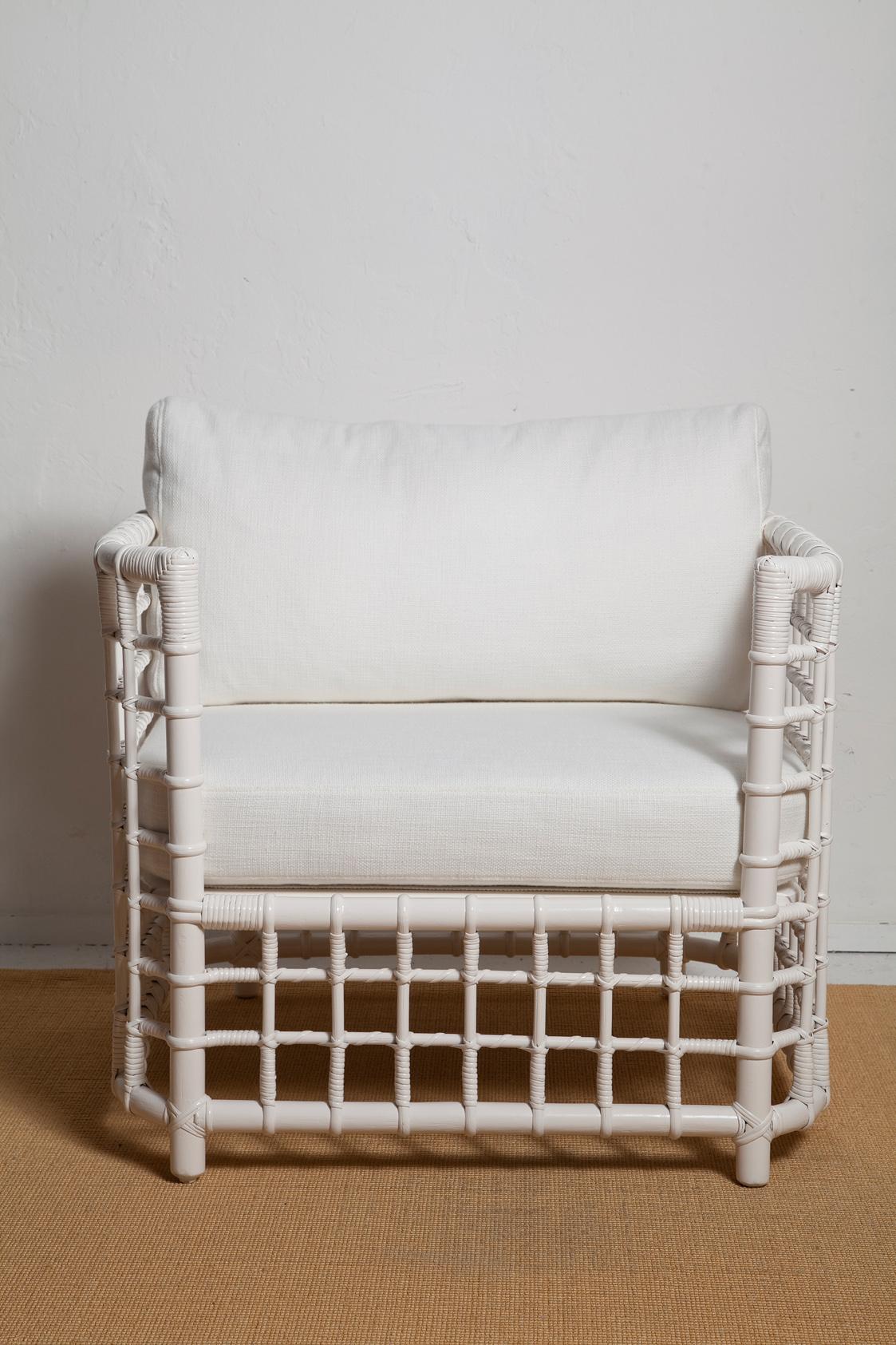 A fresh summery take on Le Corbusier's iconic LC2 chair, these 1970's woven bamboo chairs have been given a new coat of white paint, all new foam cushions (backs are down-wrapped for added comfort), and simple textured cotton blend upholstery.