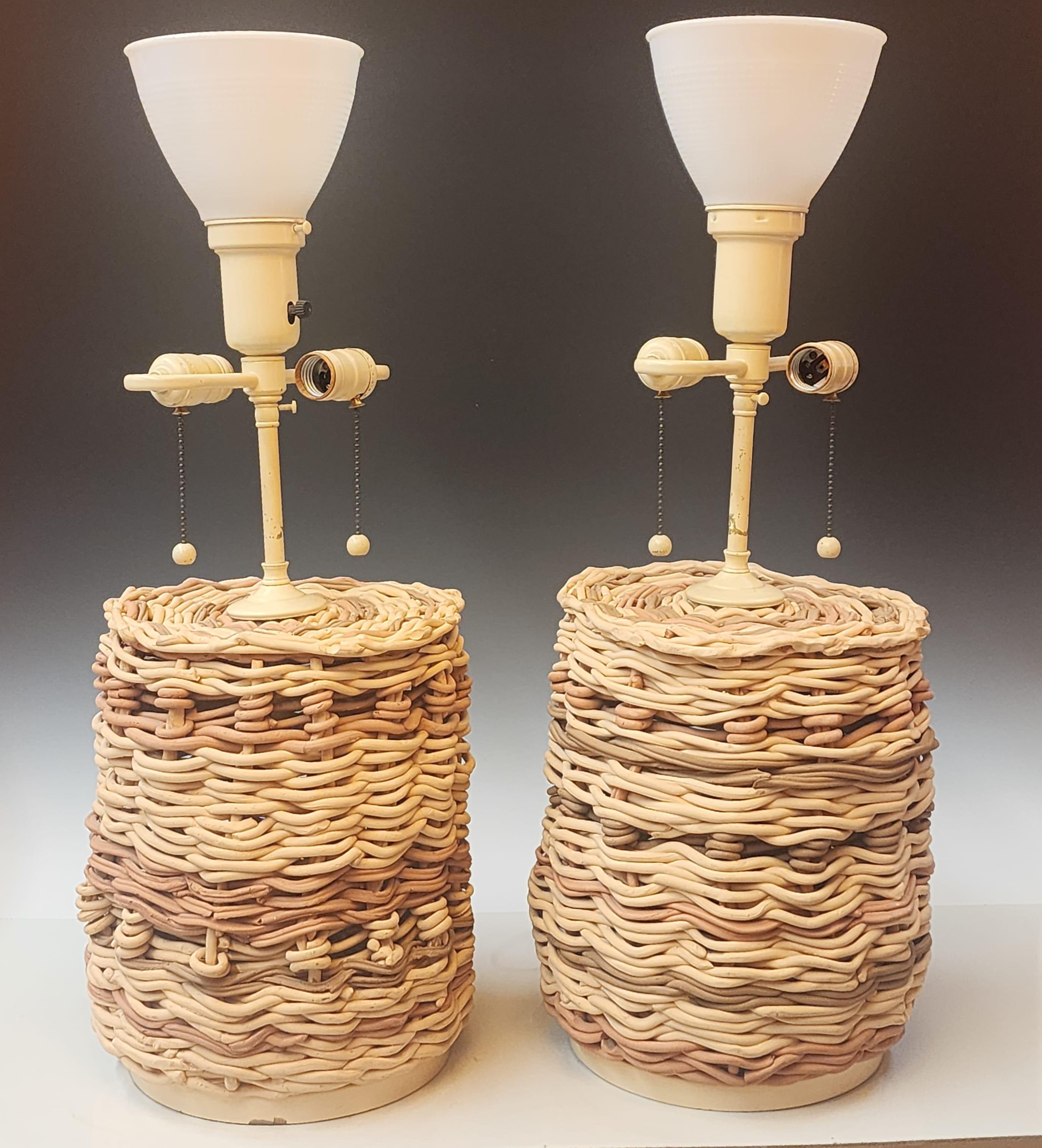 Pair of woven pottery lamps attributed to Samuel Marx circa 1950.   Fresh from a Chicago estate.   Amazing woven pottery bases made to look like wicker baskets.   While reminiscent of a later lamp 1975 designed by John Dickinson done in plaster 