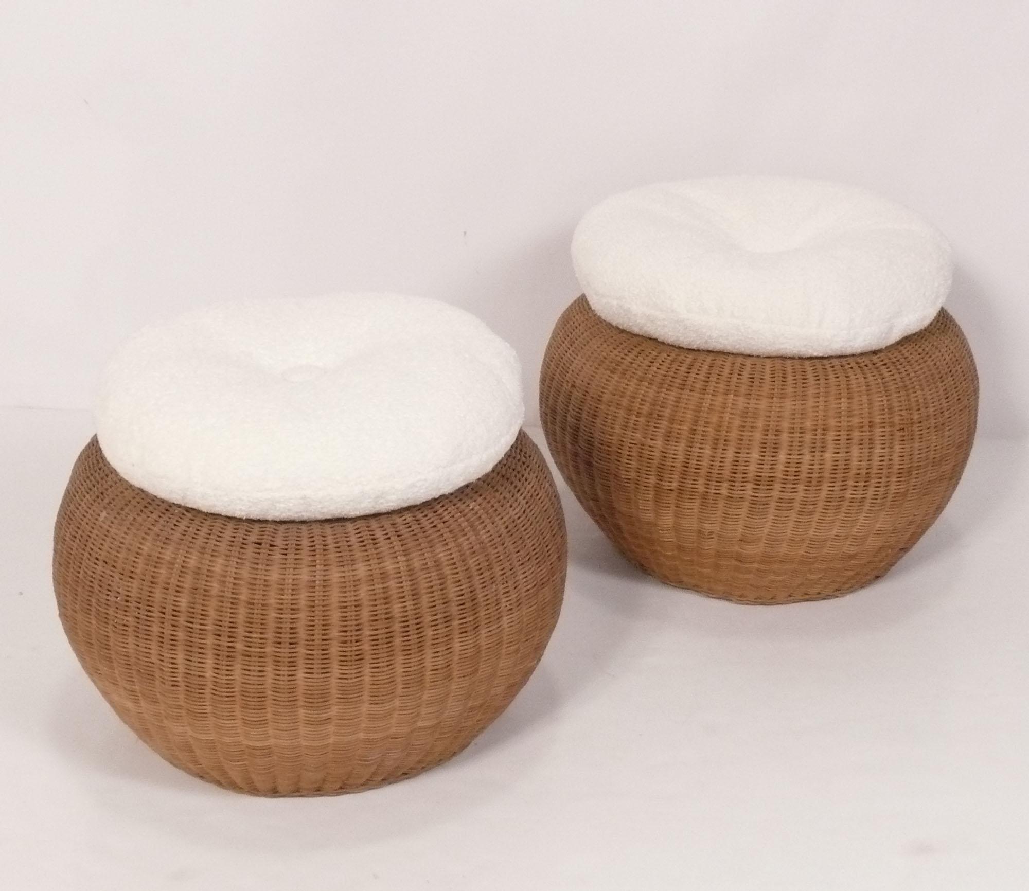 Curvaceous Pair of Woven Wicker or Rattan Stools, attributed to Isamu Kenmochi, Japan, circa 1950s. Their loose cushions have recently been reupholstered in a plush ivory color boucle. 
