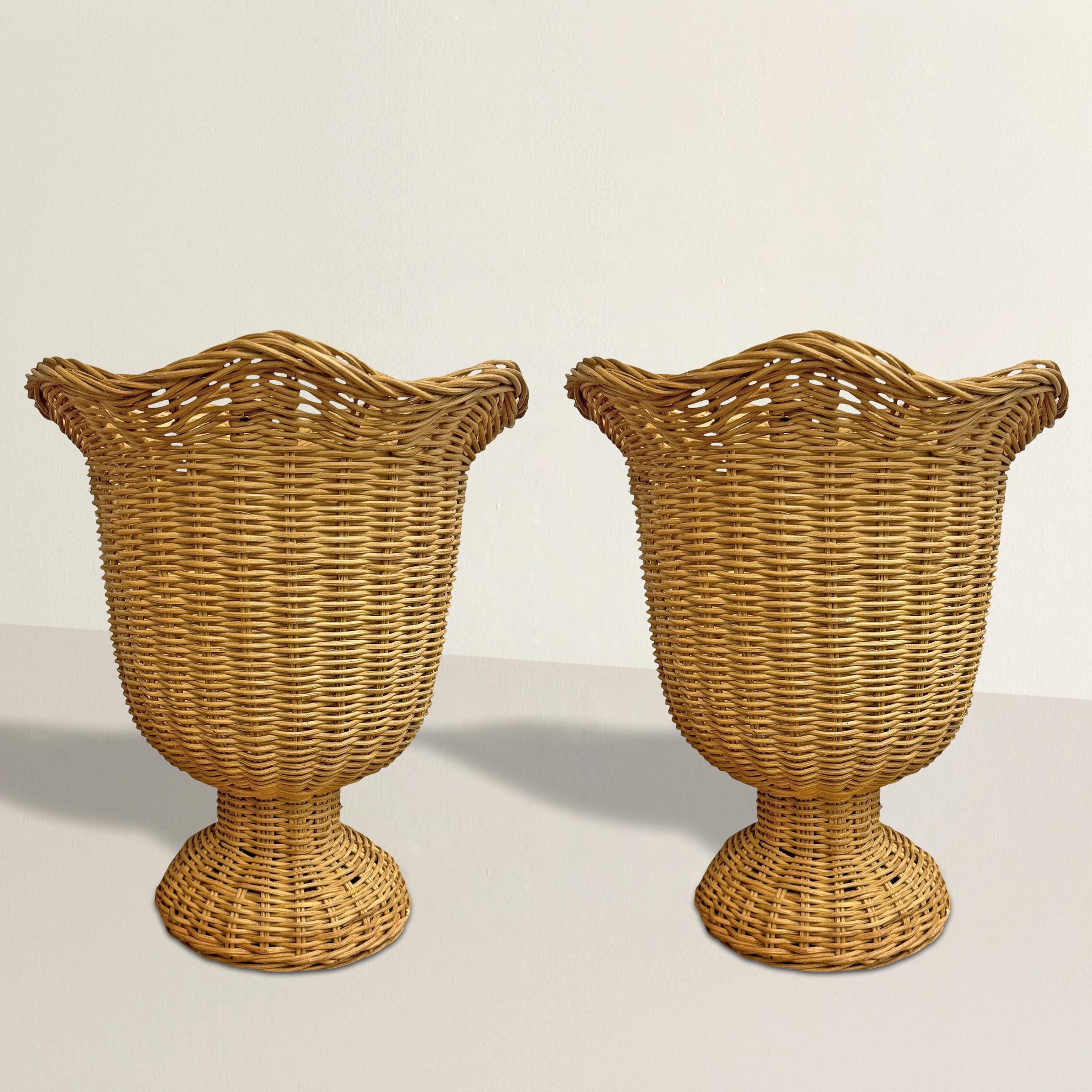 This pair of large-scale hand-woven wicker urns beautifully blends modern style with vintage charm. Each urn features a gracefully scalloped rim, adding a touch of elegance to their natural, rustic appeal. The generous size and sturdy construction