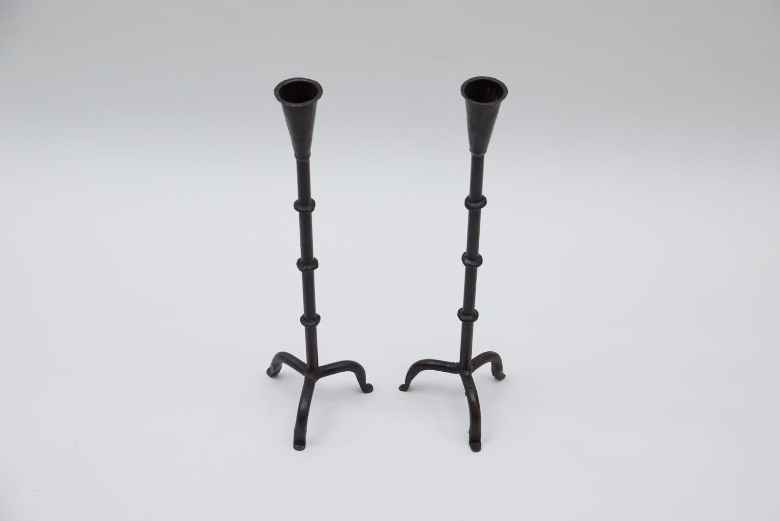 Super decorative.

These two candleholders measure 55cm in height and 15cm in width. 
The top diameter measures 4cm and tapers to 2.5cm at the bottom.