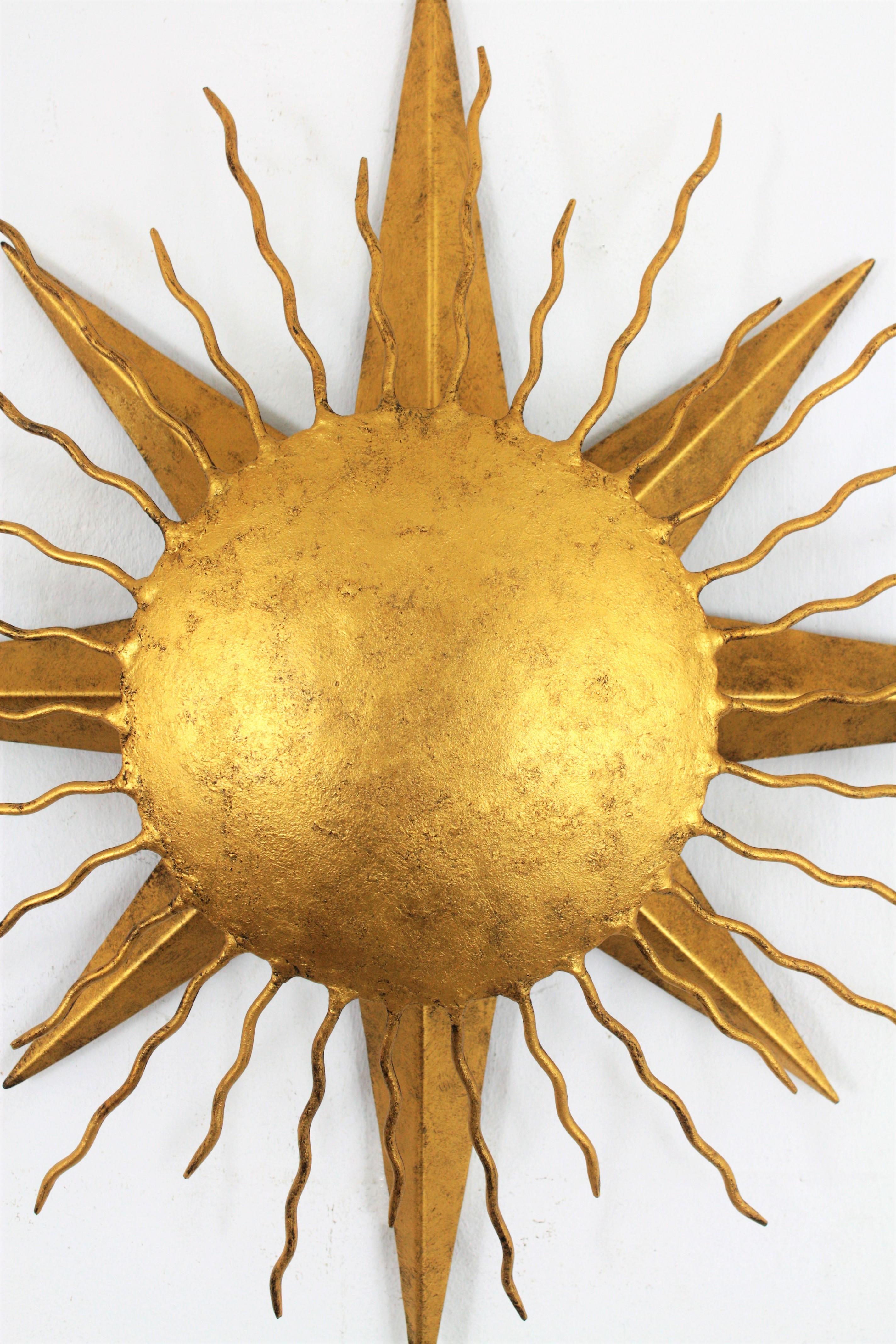 Spanish Pair of Wrought Gilt Iron Starburst Sunburst Wall Light Fixtures, Spain 1950s