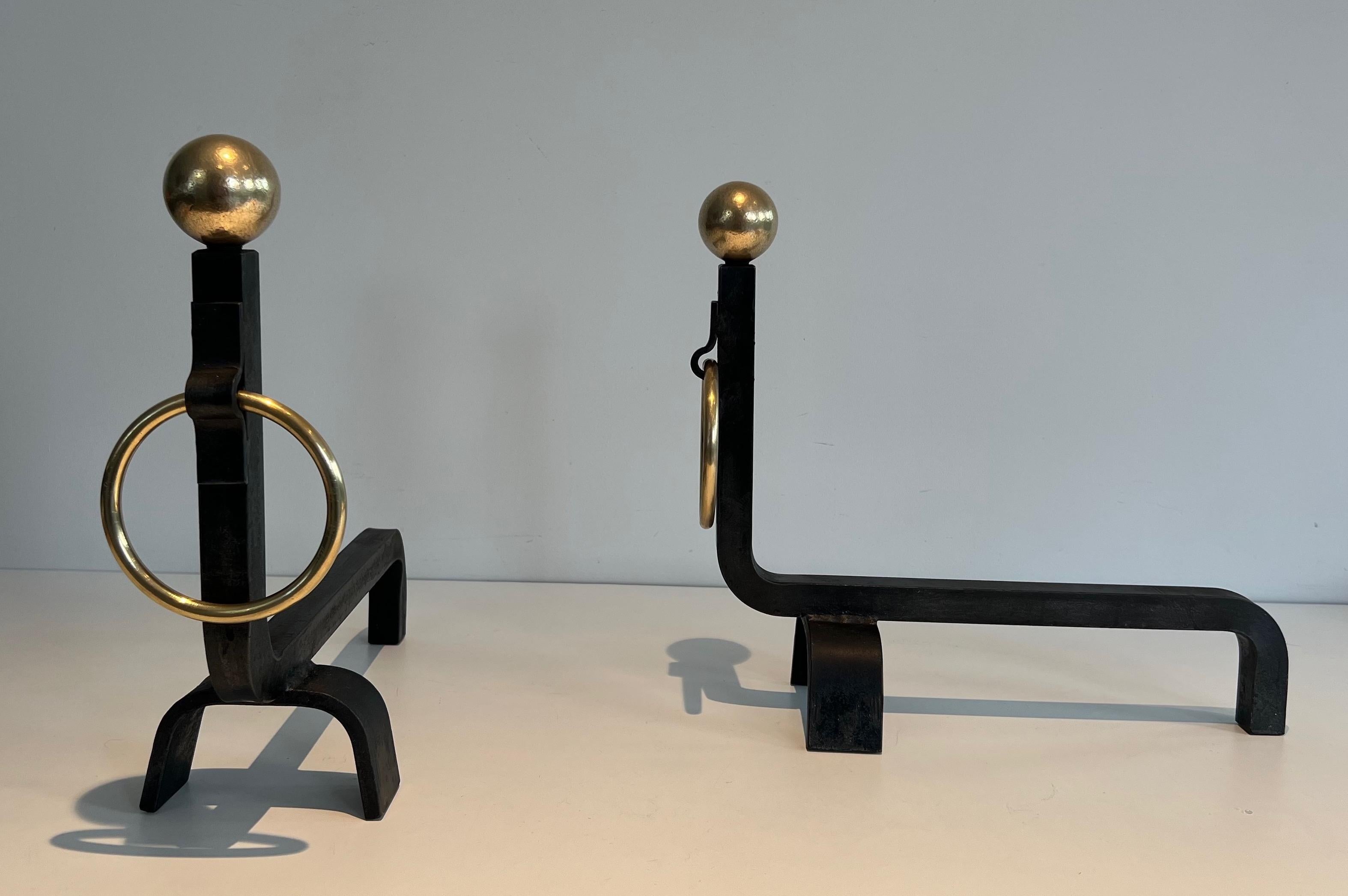Pair of Wrought Iron and Brass Andirons in the style of Jacques Adnet In Good Condition For Sale In Marcq-en-Barœul, Hauts-de-France