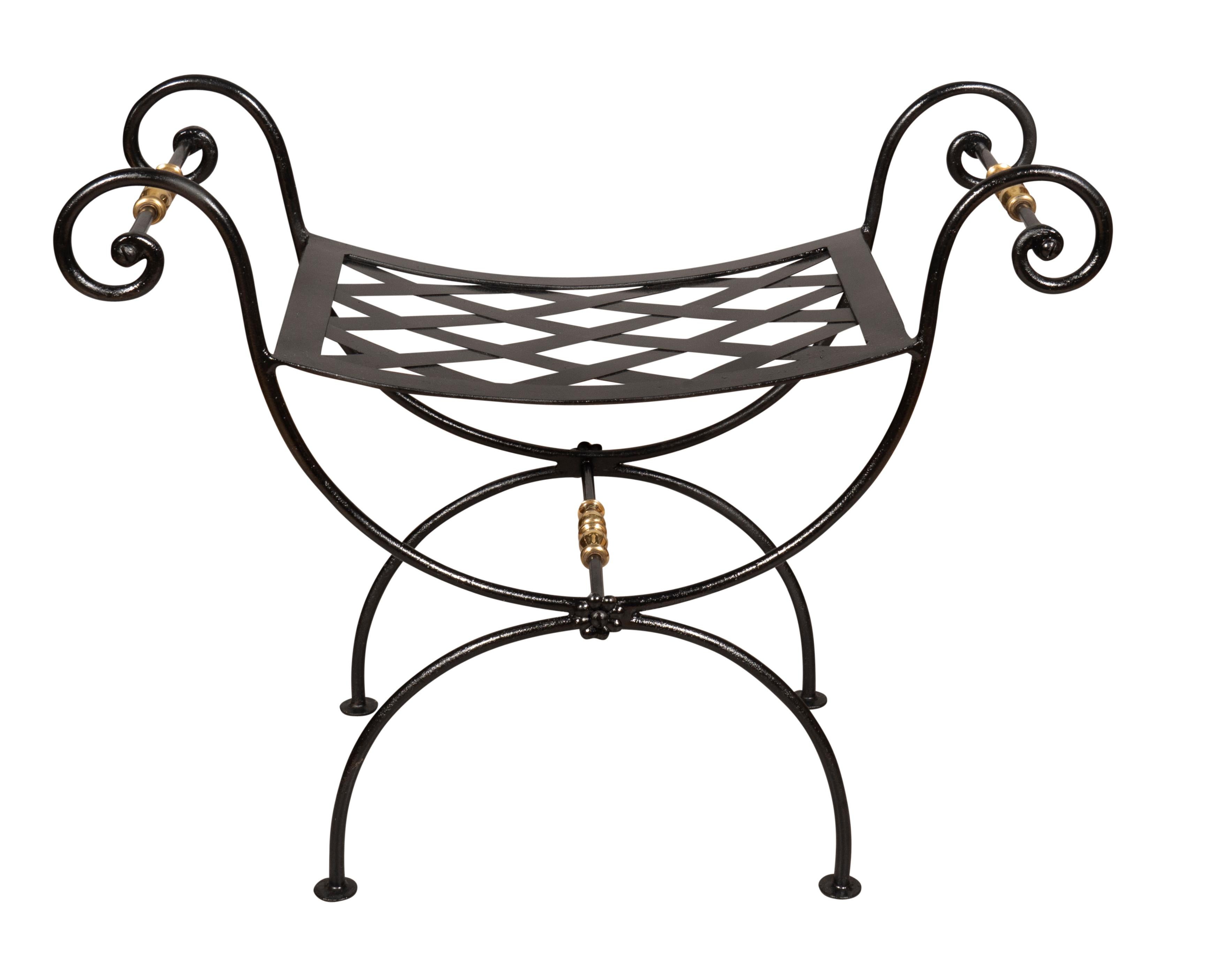 Each with scrolled arms with polished brass , metal woven seats, curule form legs.