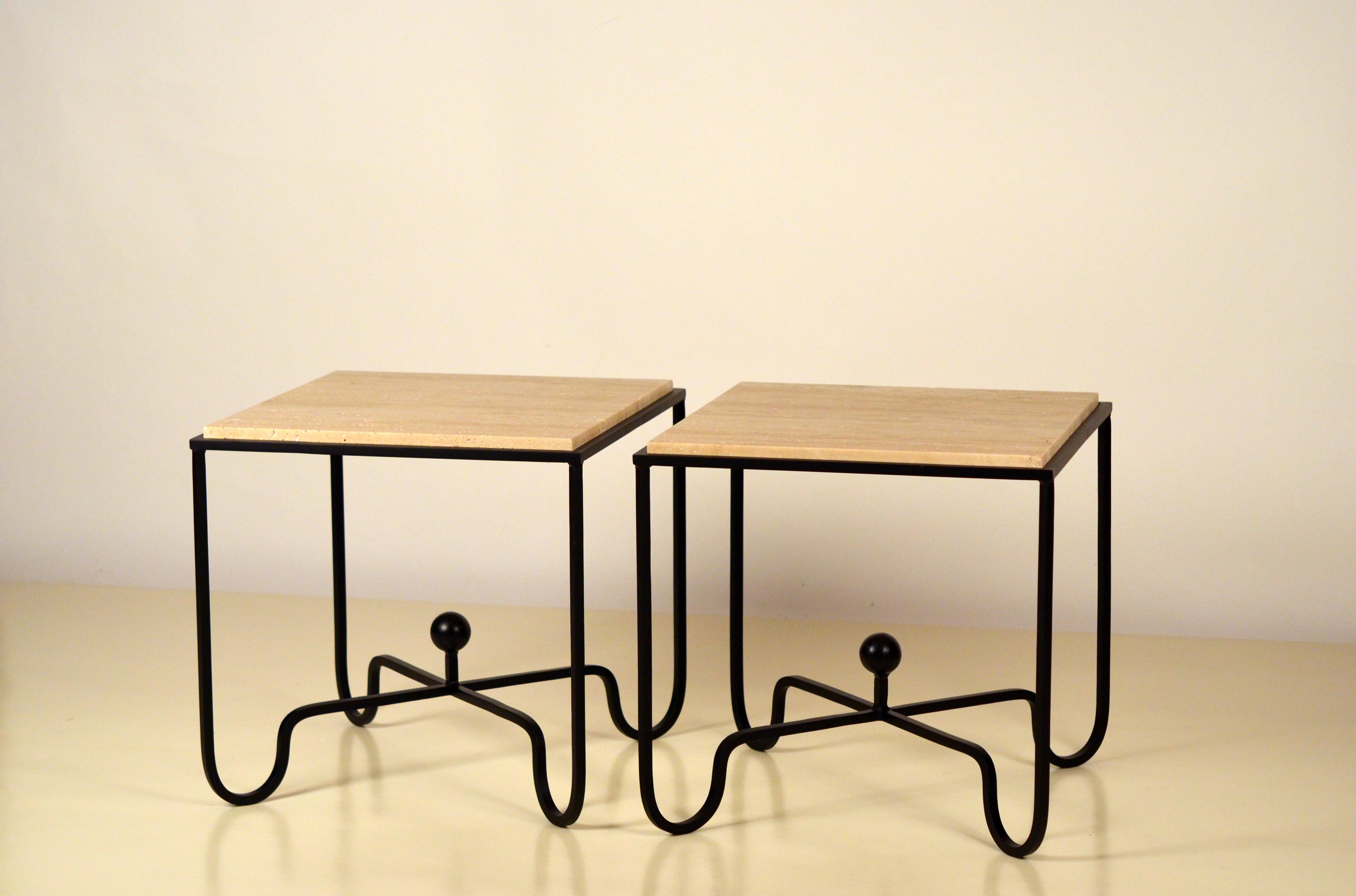 Pair of wrought iron and travertine 'Entretoise' side tables by Design Frères. Chic pair of versatile side or end tables. Also great as a two-part coffee table. Indoor or outdoor use.