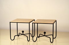 Paire de tables d'appoint en fer forgé et travertin 'Entretoise' par Design Frères