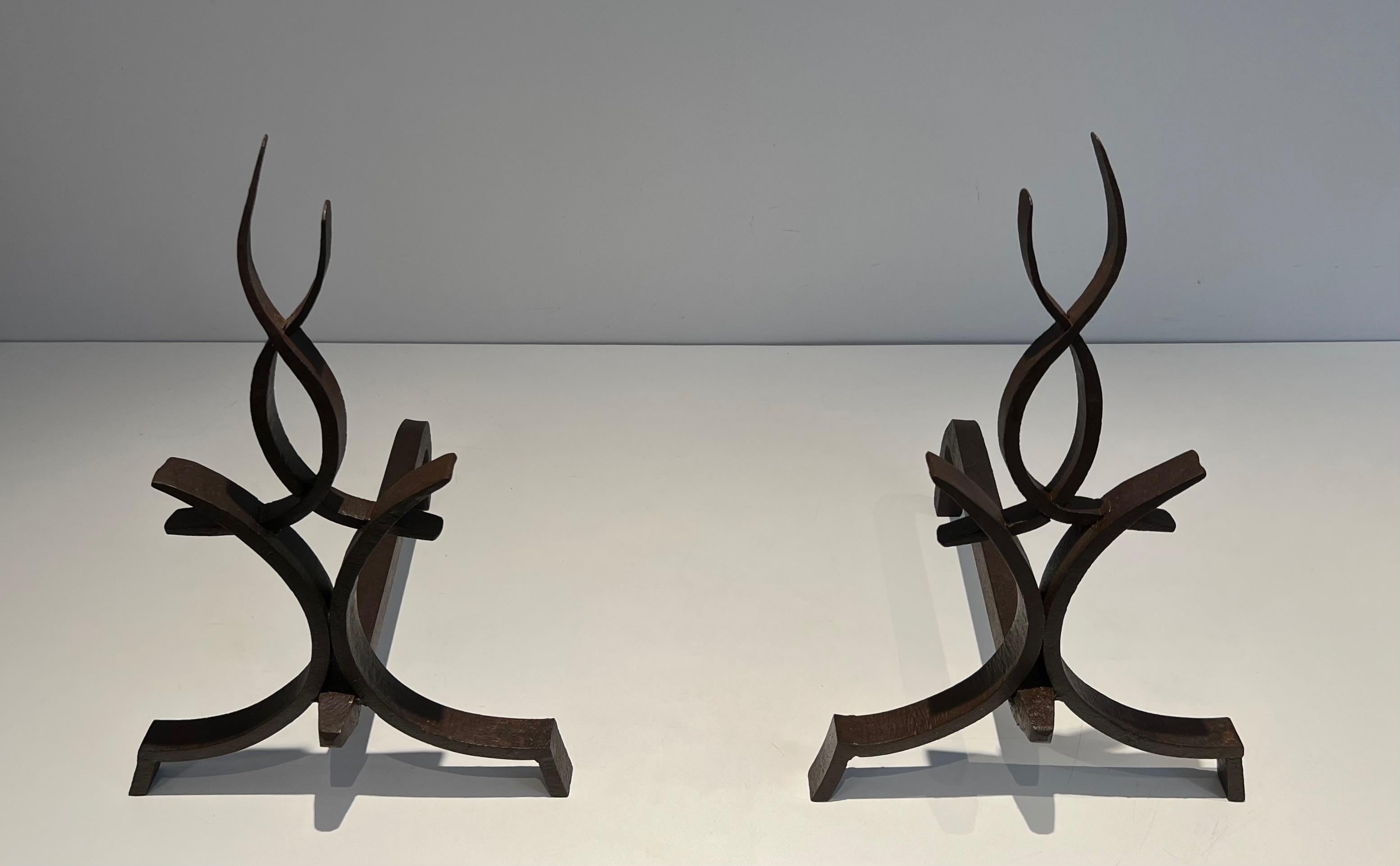 Mid-Century Modern Pair of Wrought Iron Andirons by Raymond Subes For Sale