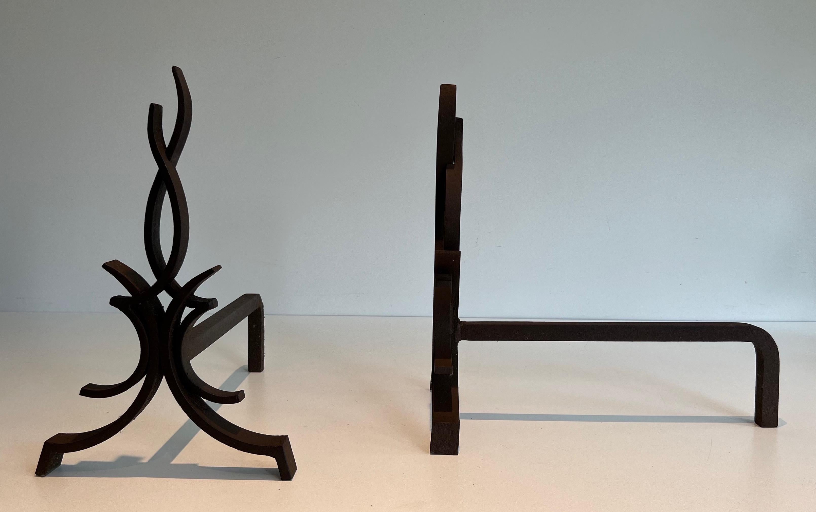 Mid-20th Century Pair of Wrought Iron Andirons by Raymond Subes For Sale